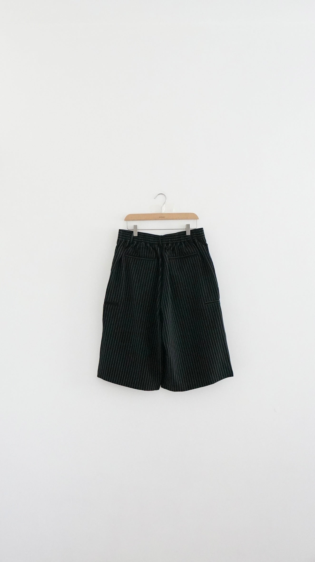 striped low-rise tailored shorts in black (pre-order)