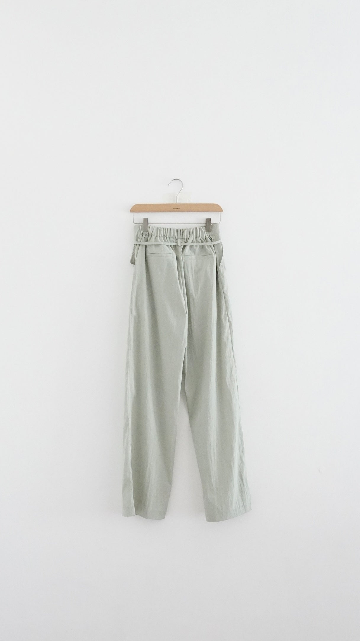 silken pleated tailored trousers in light green