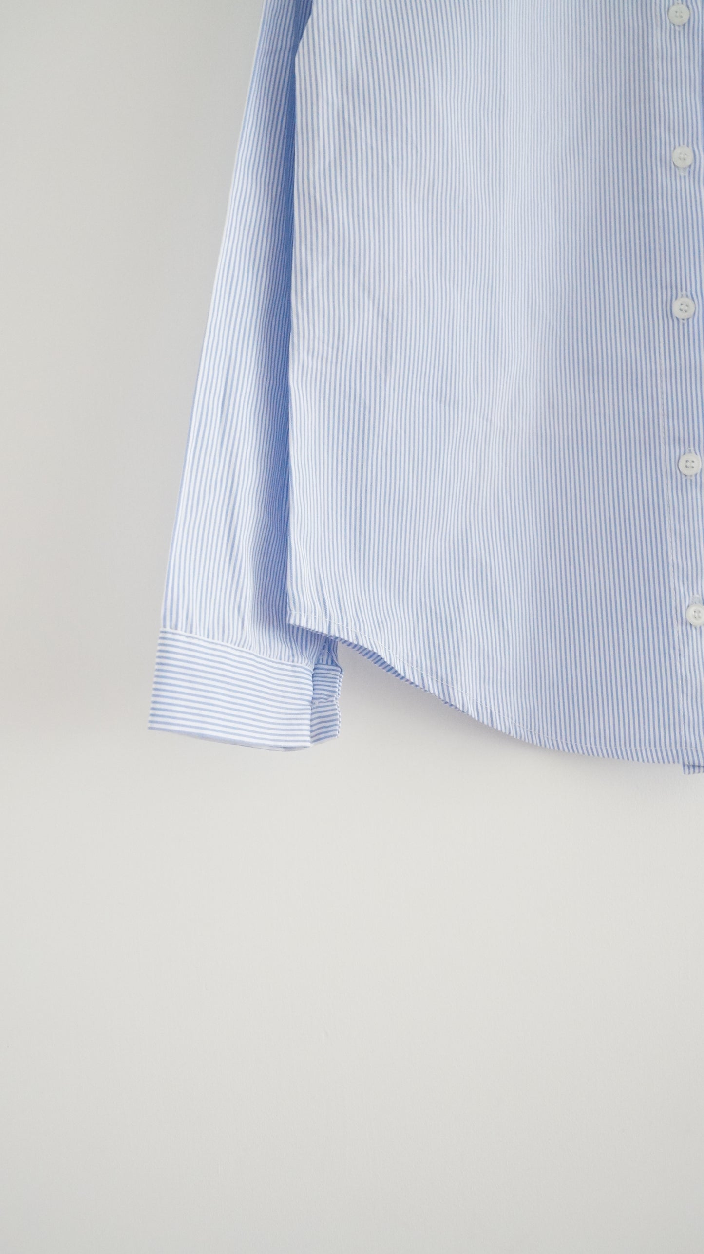 ruffle neck striped shirt in baby blue