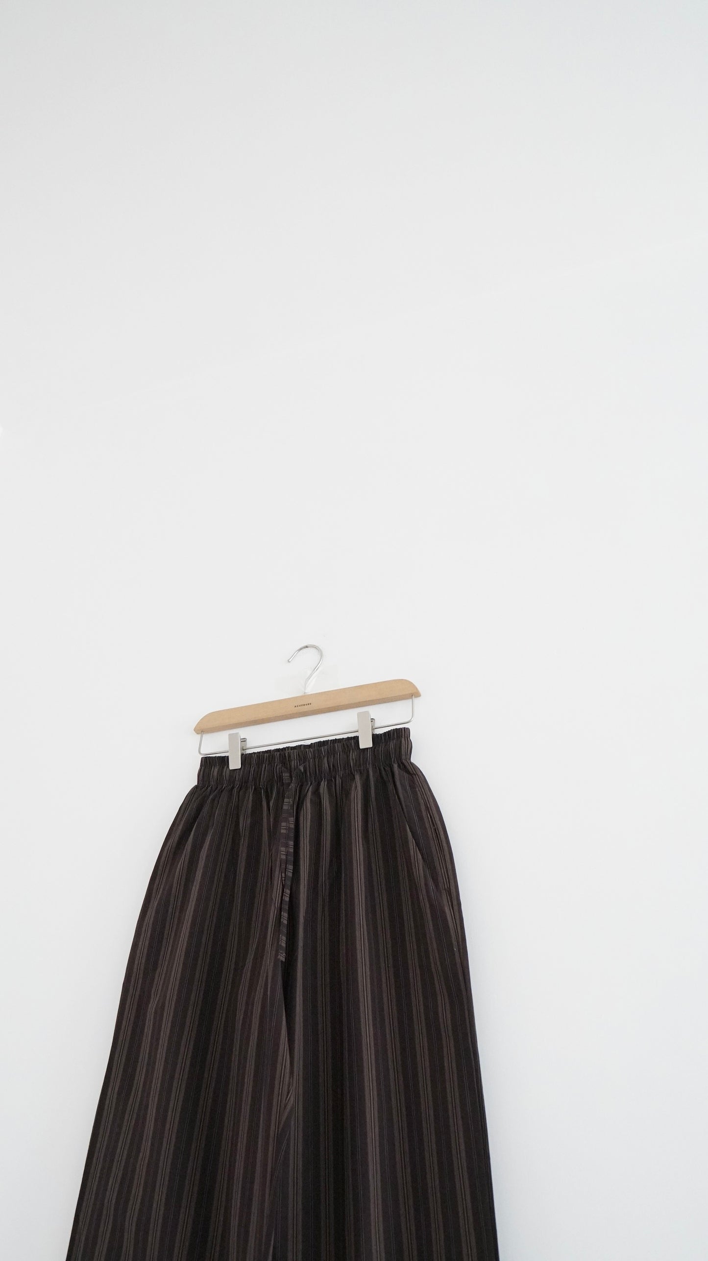 high-end striped pants in brown