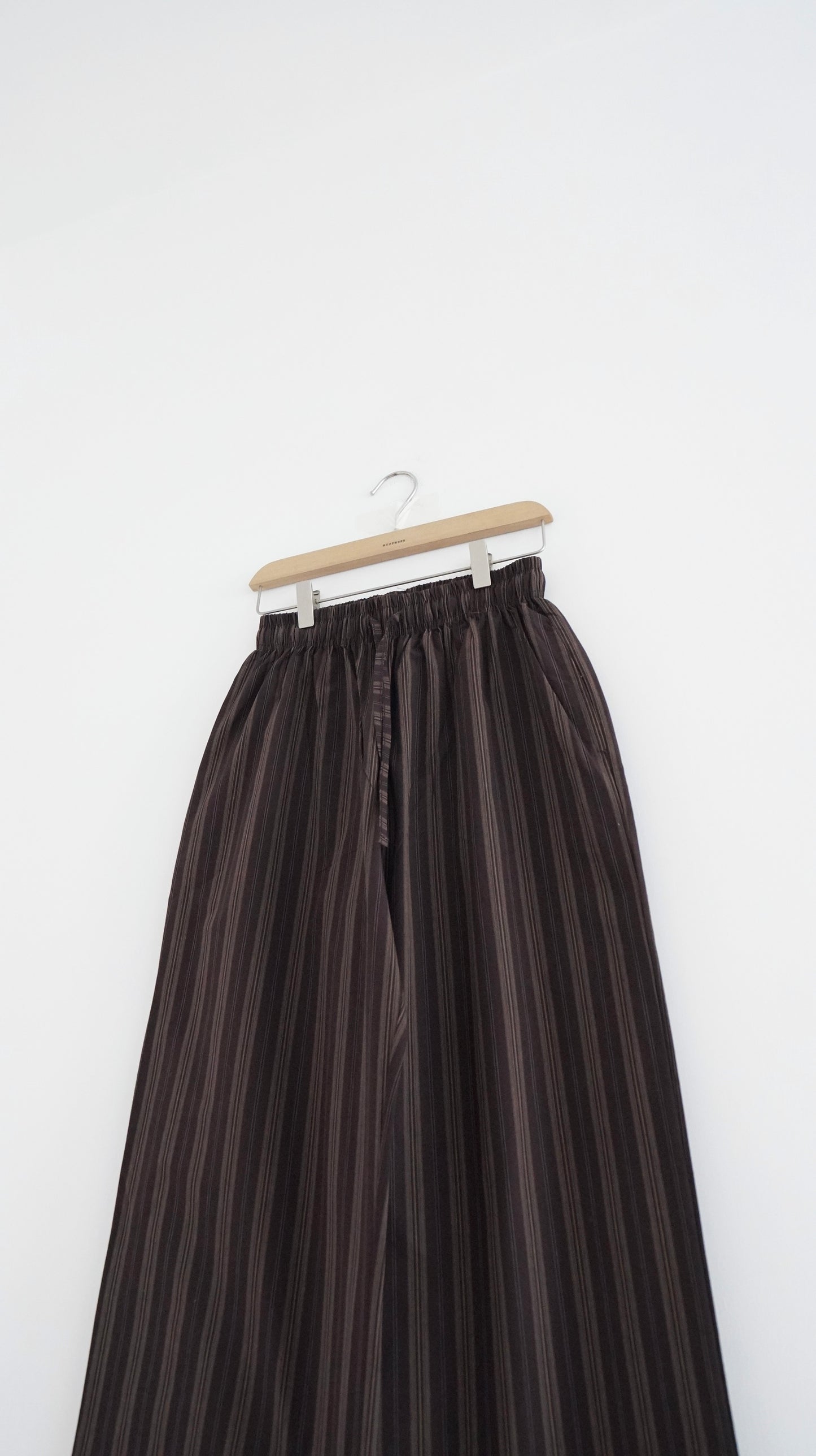 high-end striped pants in brown