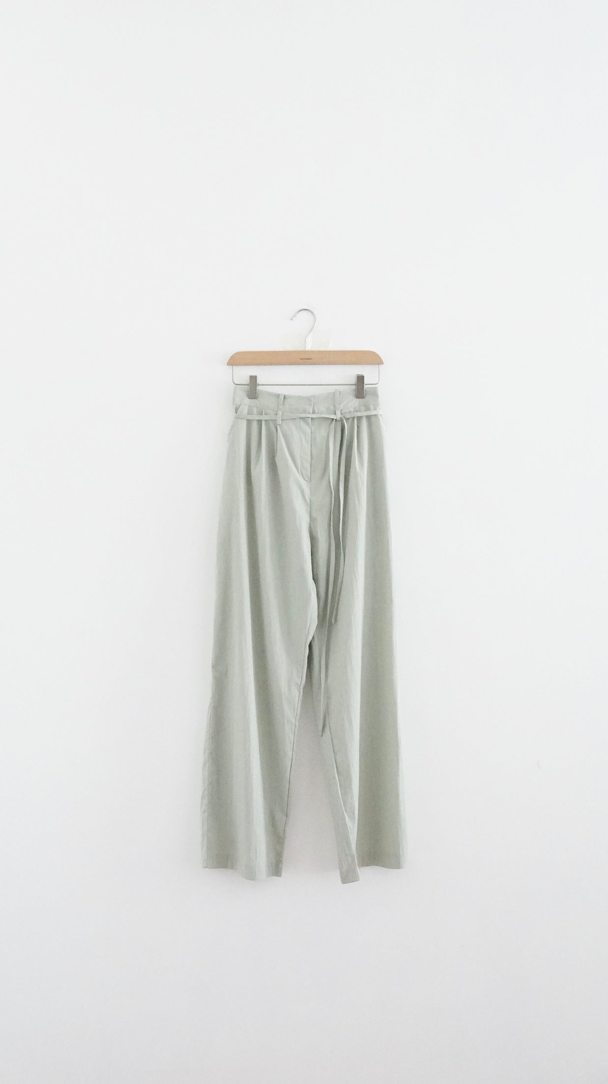 silken pleated tailored trousers in light green
