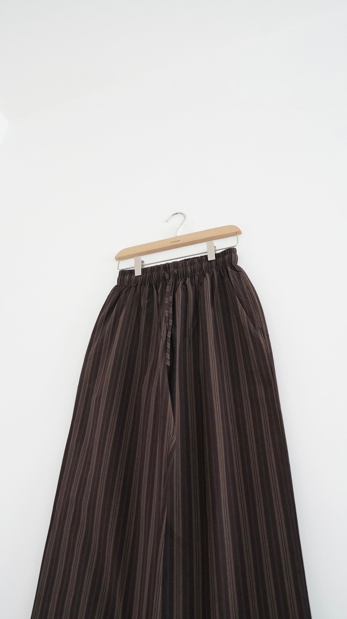 high-end striped pants in brown