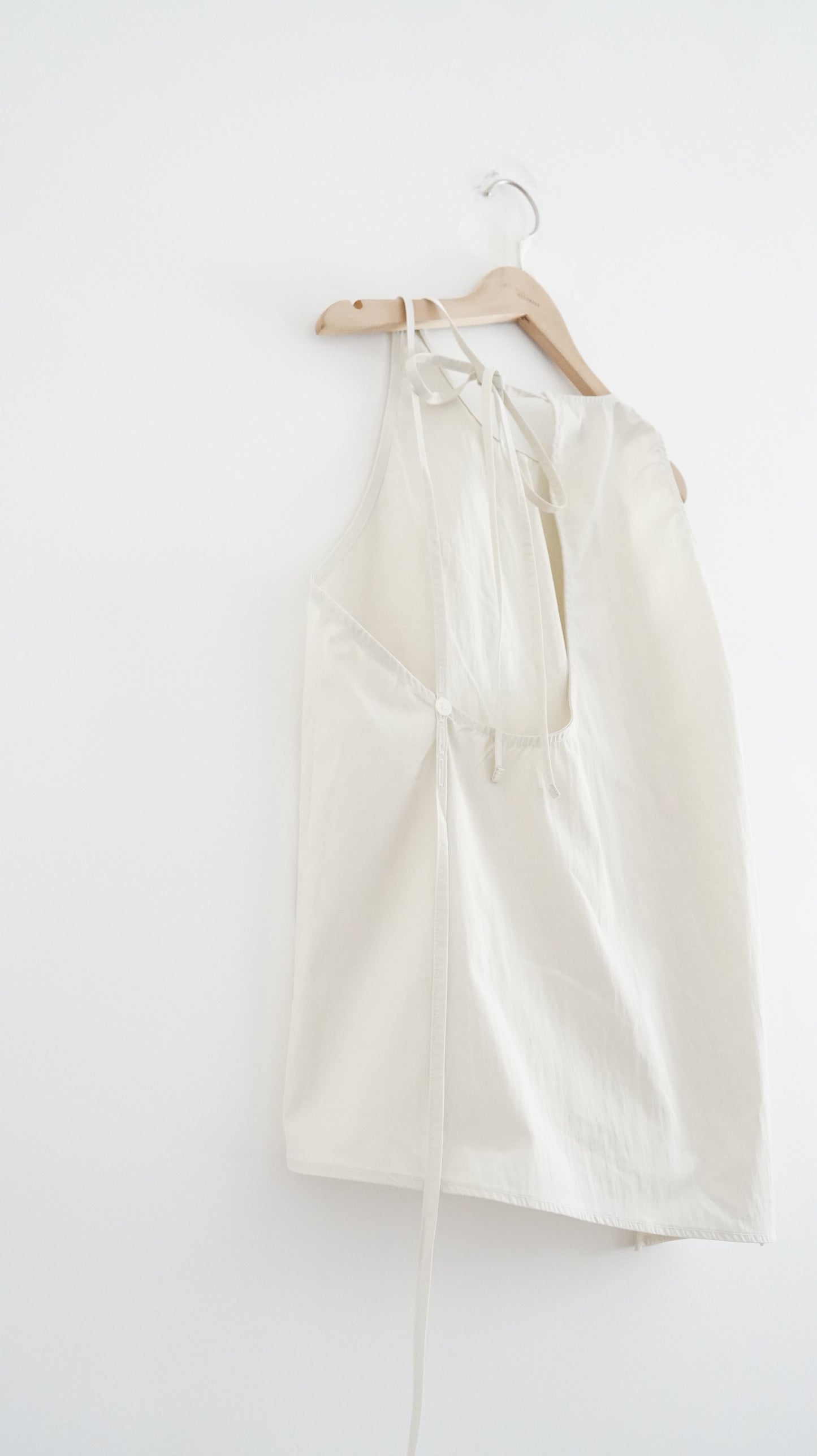 drift back bow tank in cream