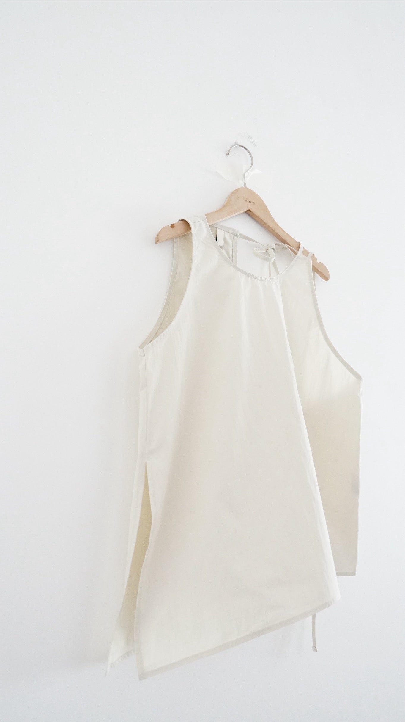 drift back bow tank in cream