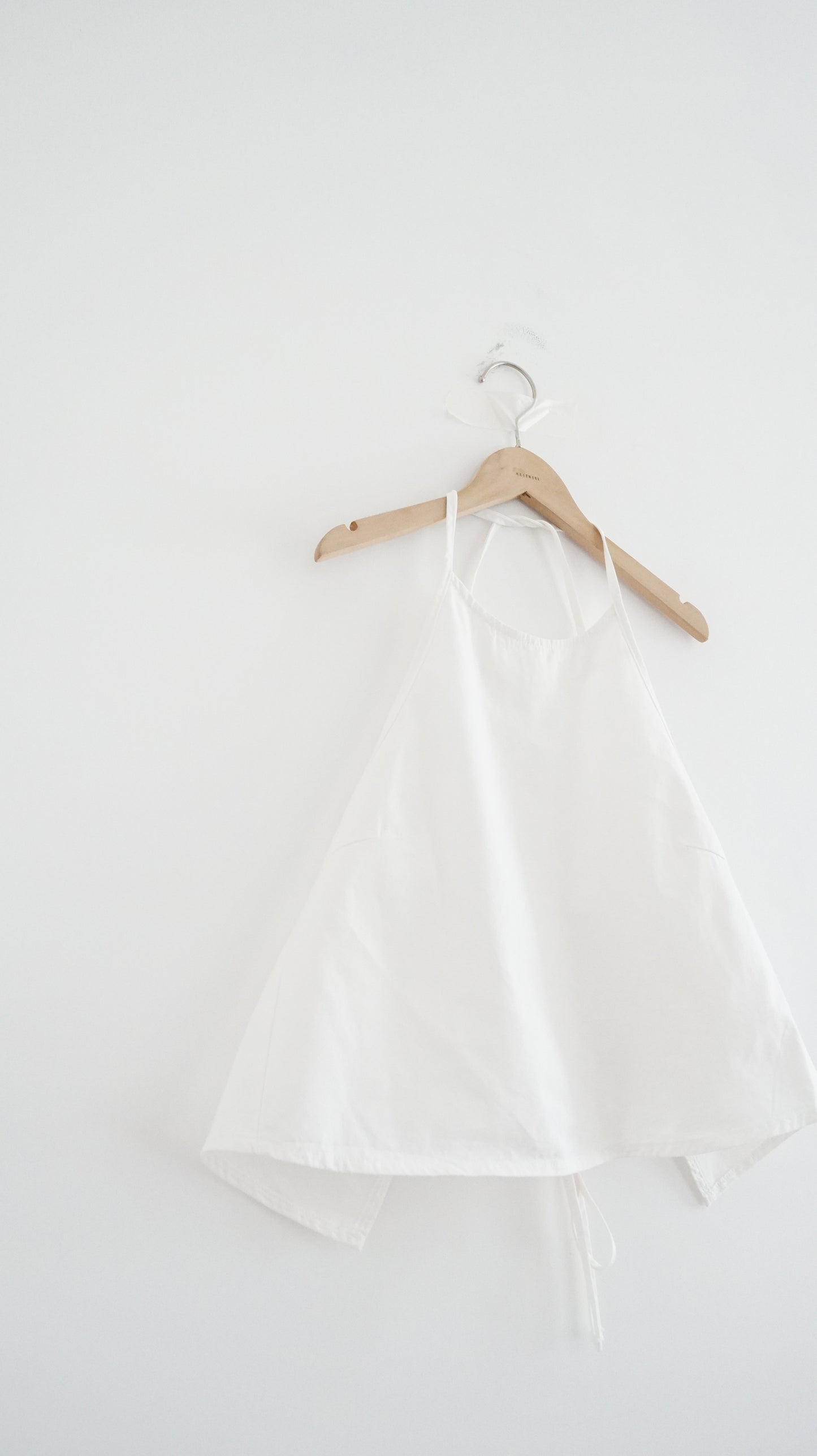 minimalist halter neck top in white