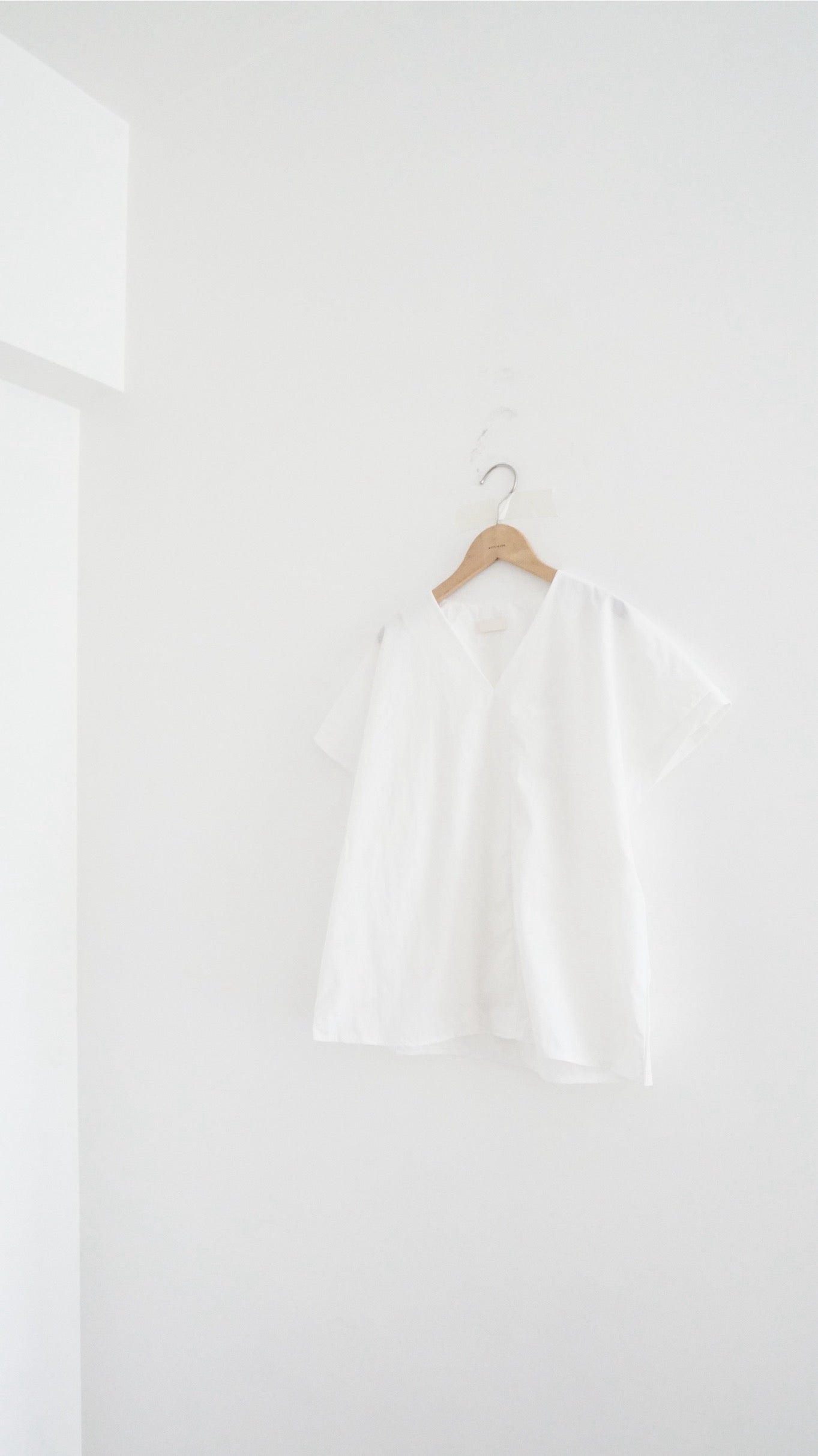sheersense v-neck blouse in white
