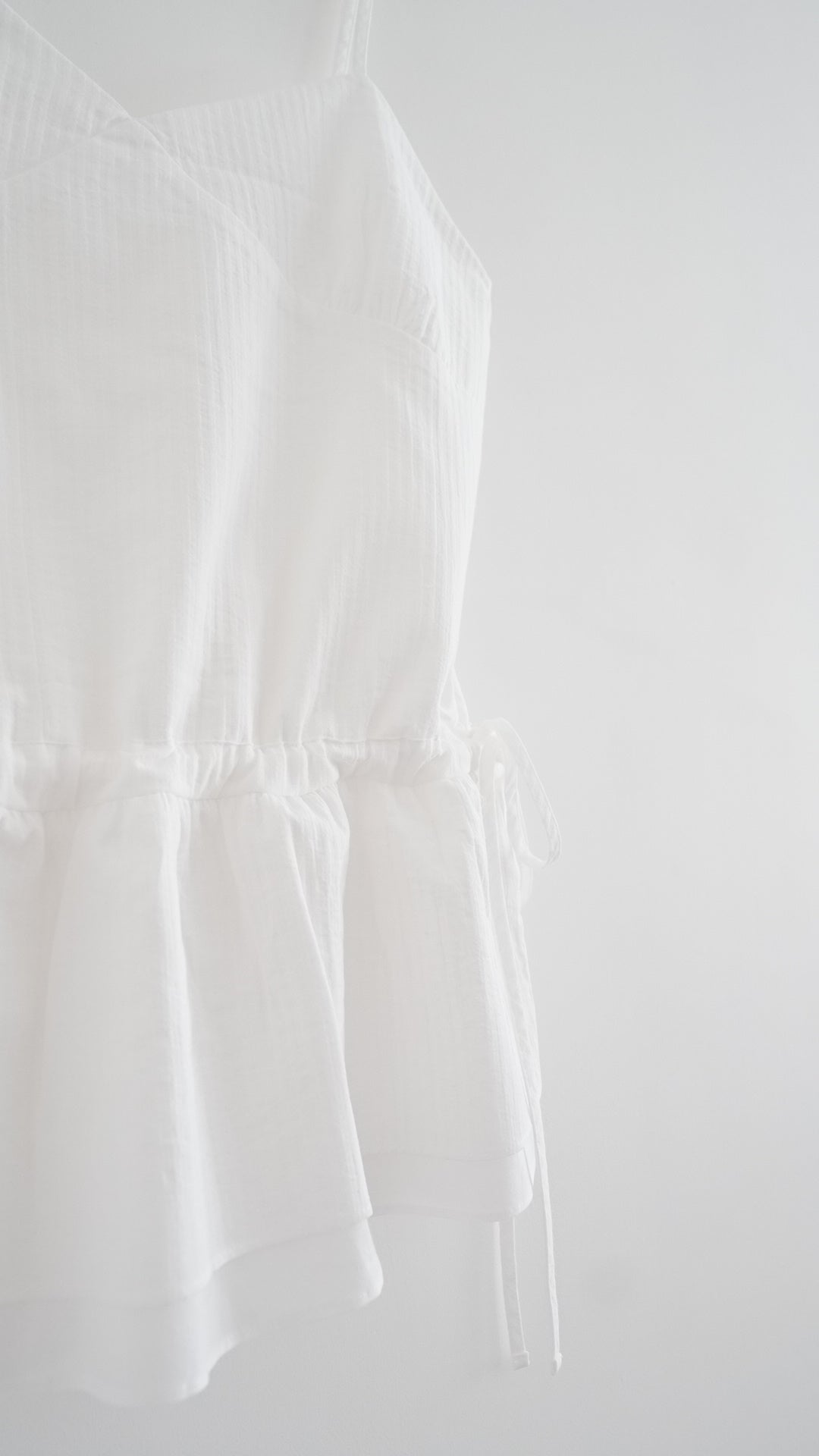 drawstring peplum camisole in white (pre-order)