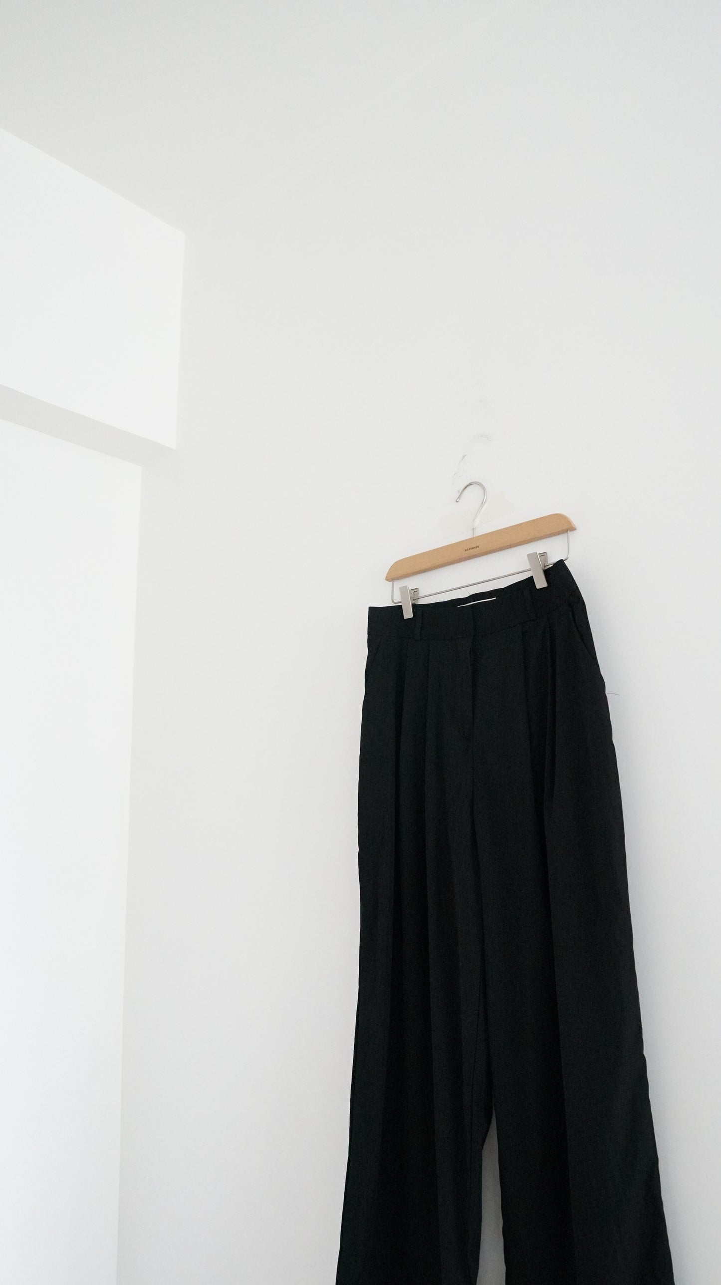 lightproof low-waist trousers in black (pre-order)