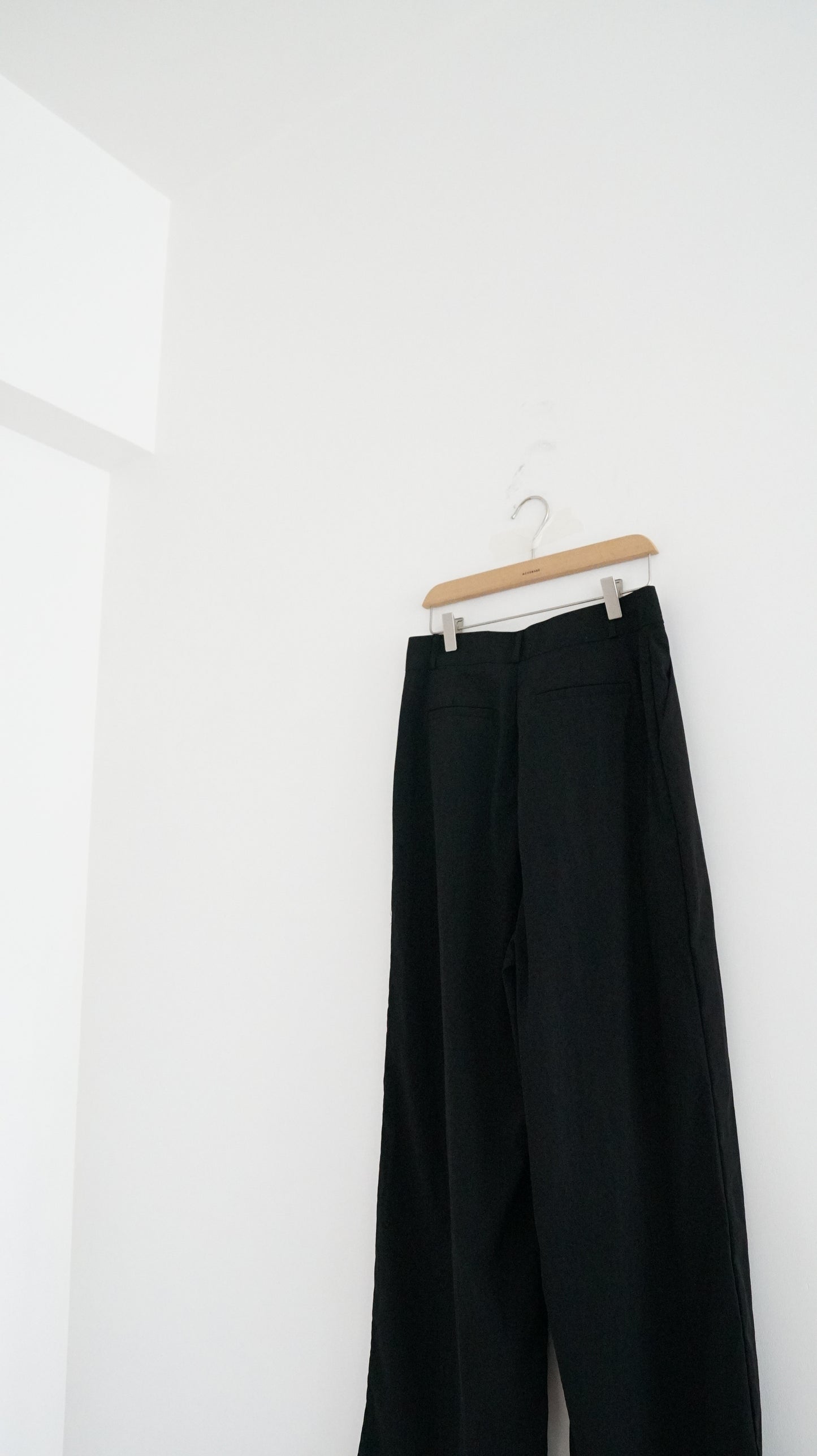 lightproof low-waist trousers in black (pre-order)