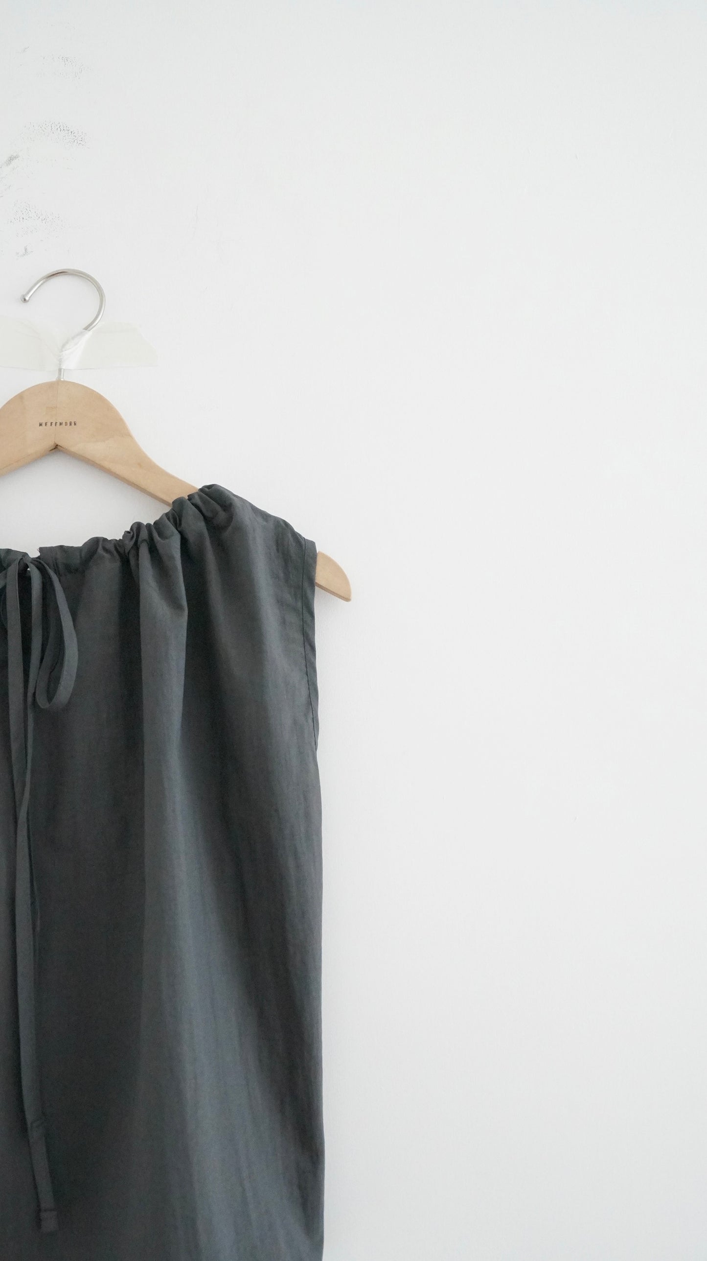 ruffle round neck blouse in charcoal (pre-order)