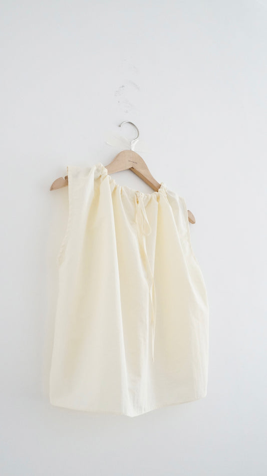 ruffle round neck blouse in cream (pre-order)