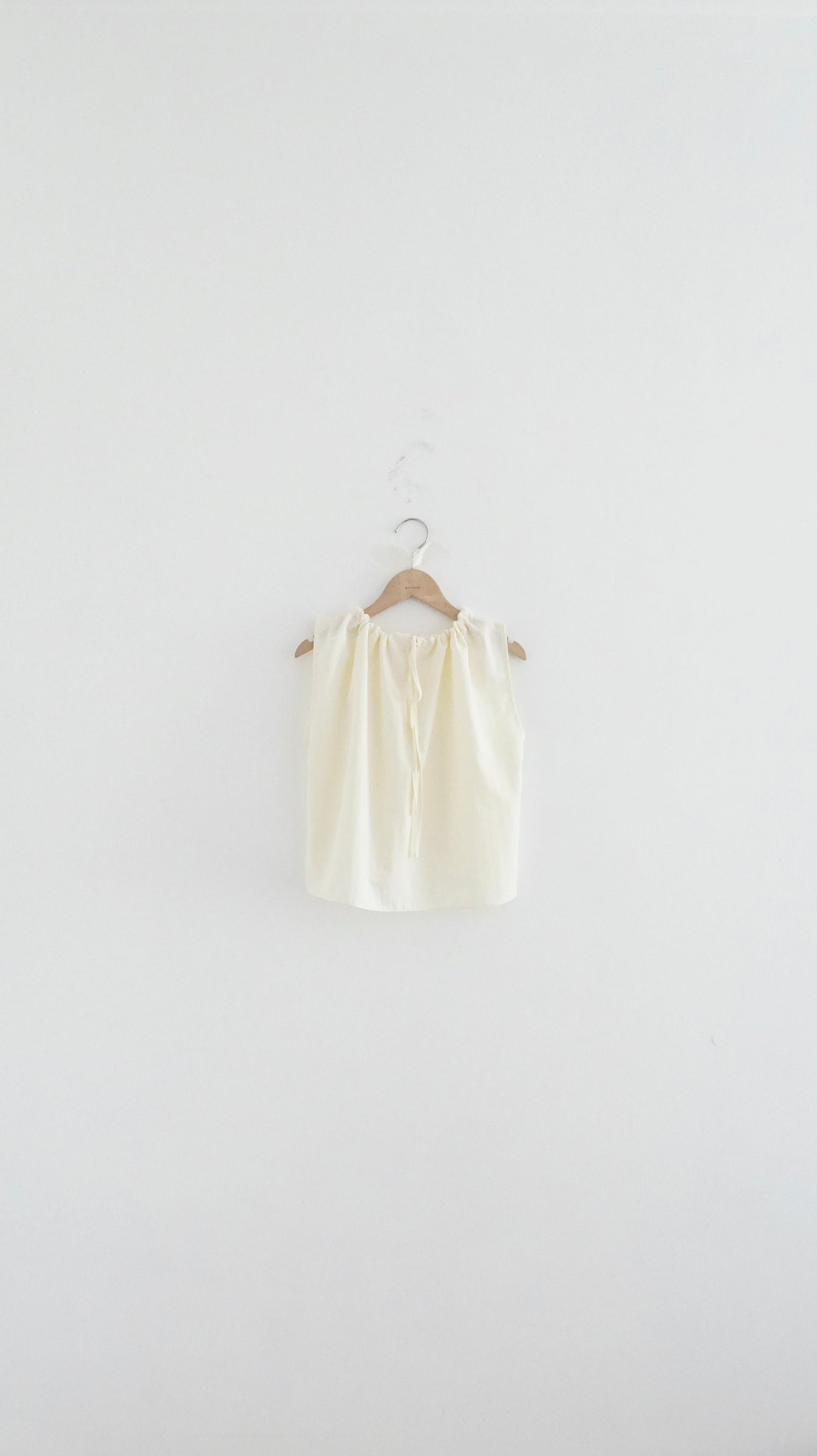 ruffle round neck blouse in cream (pre-order)