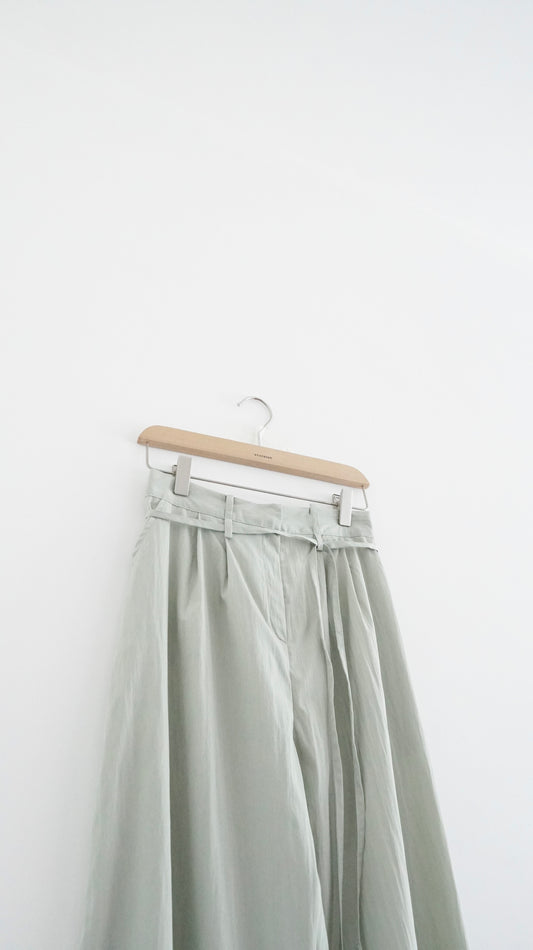 silken pleated tailored trousers in light green