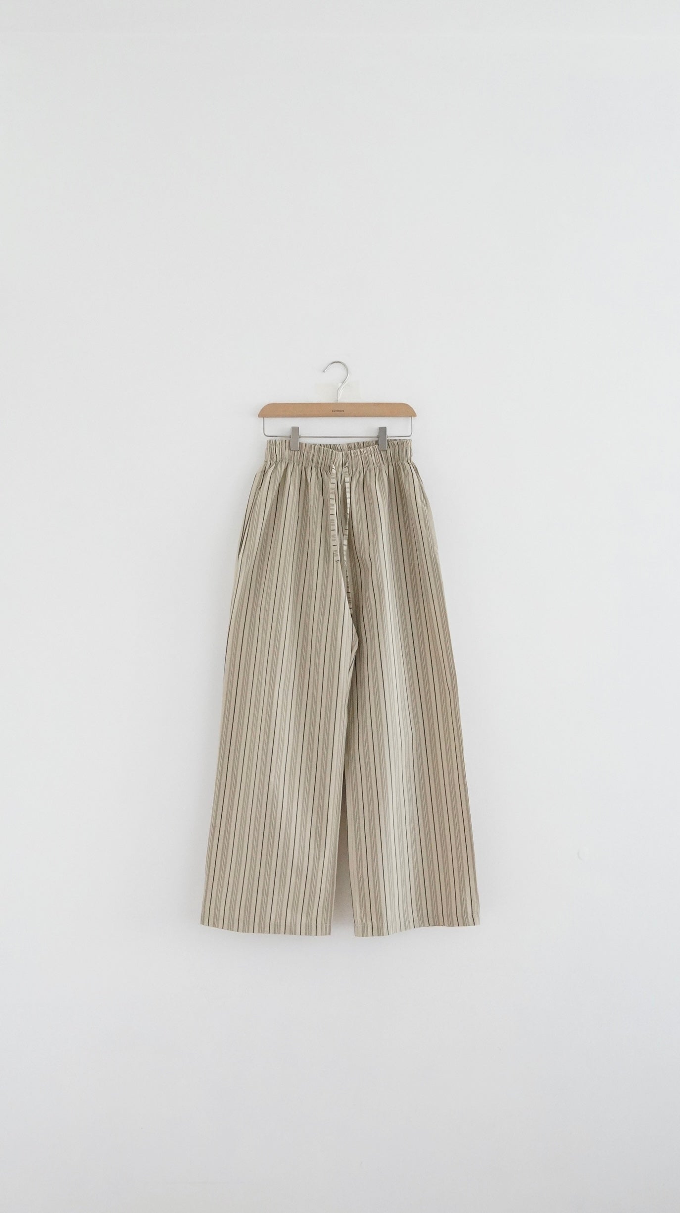 high-end striped pants in beige