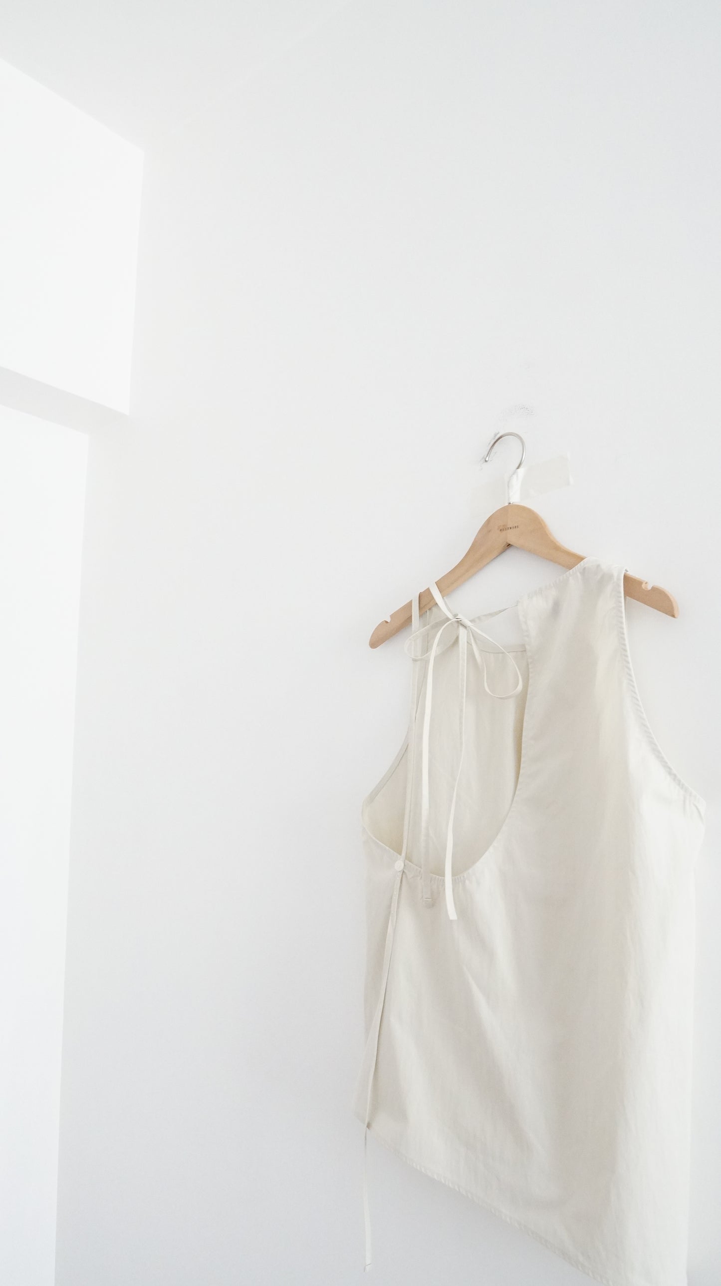 drift back bow tank in cream