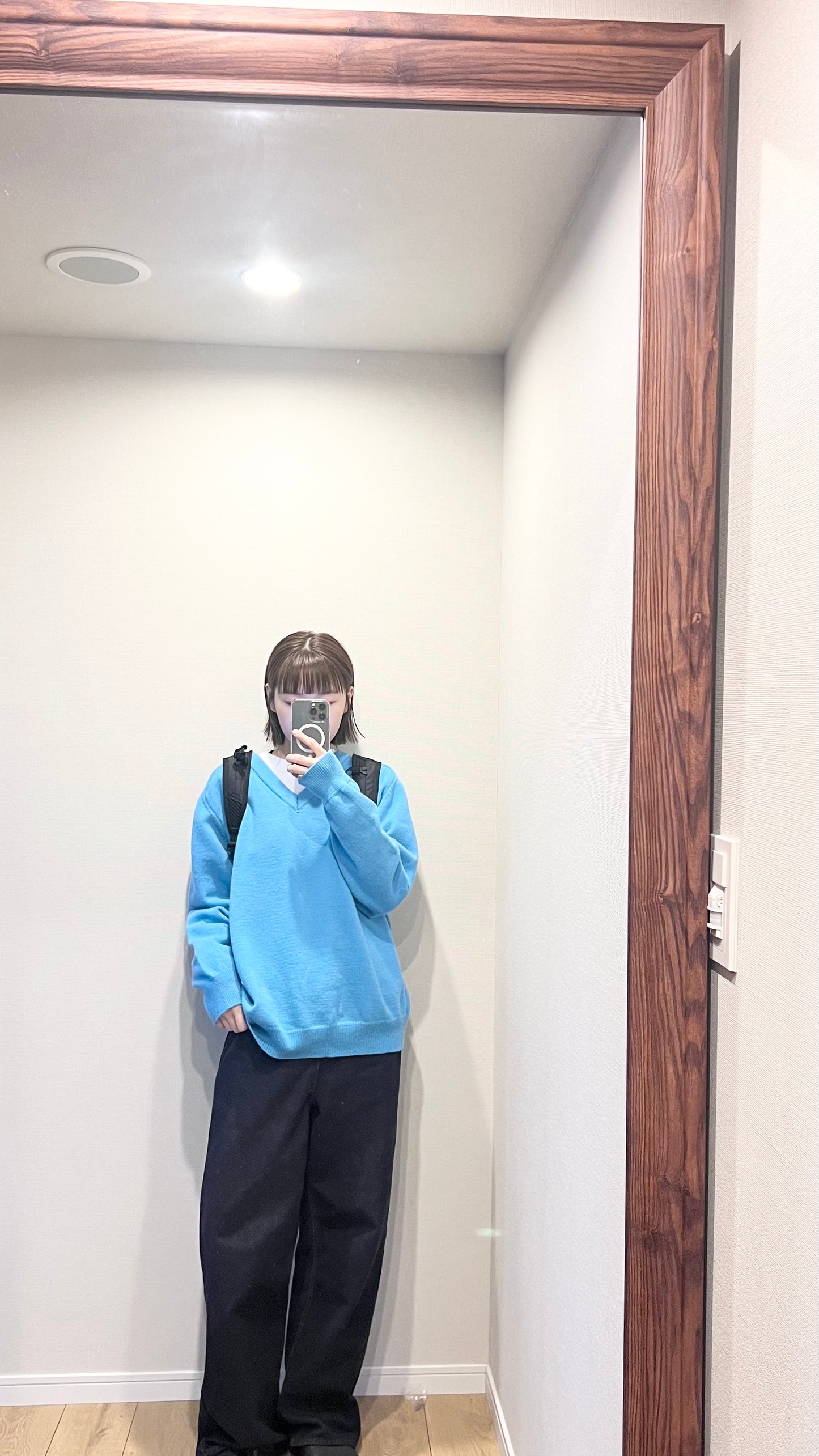 classic gender free v-neck wool sweater in lake blue