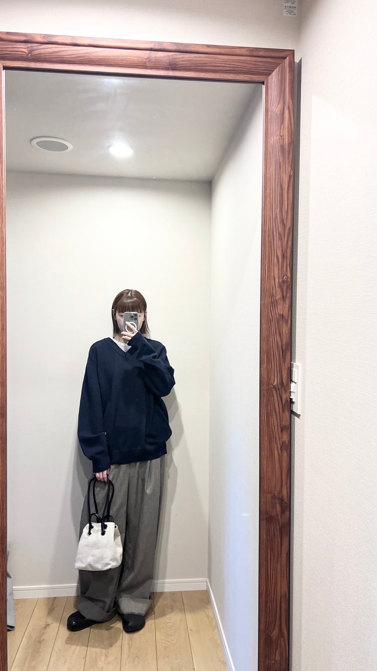 classic gender free v-neck wool sweater in navy