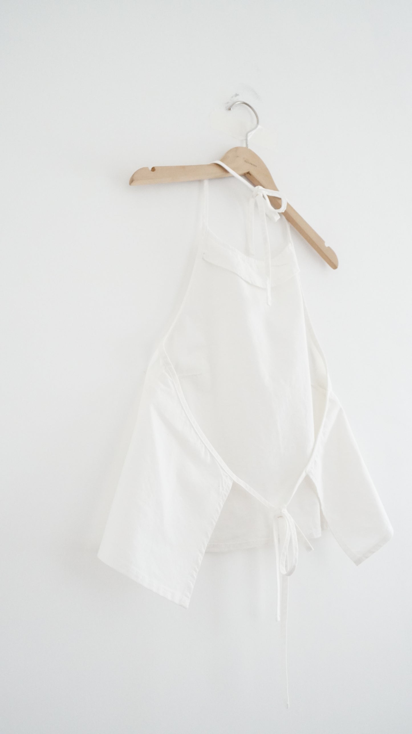 minimalist halter neck top in white