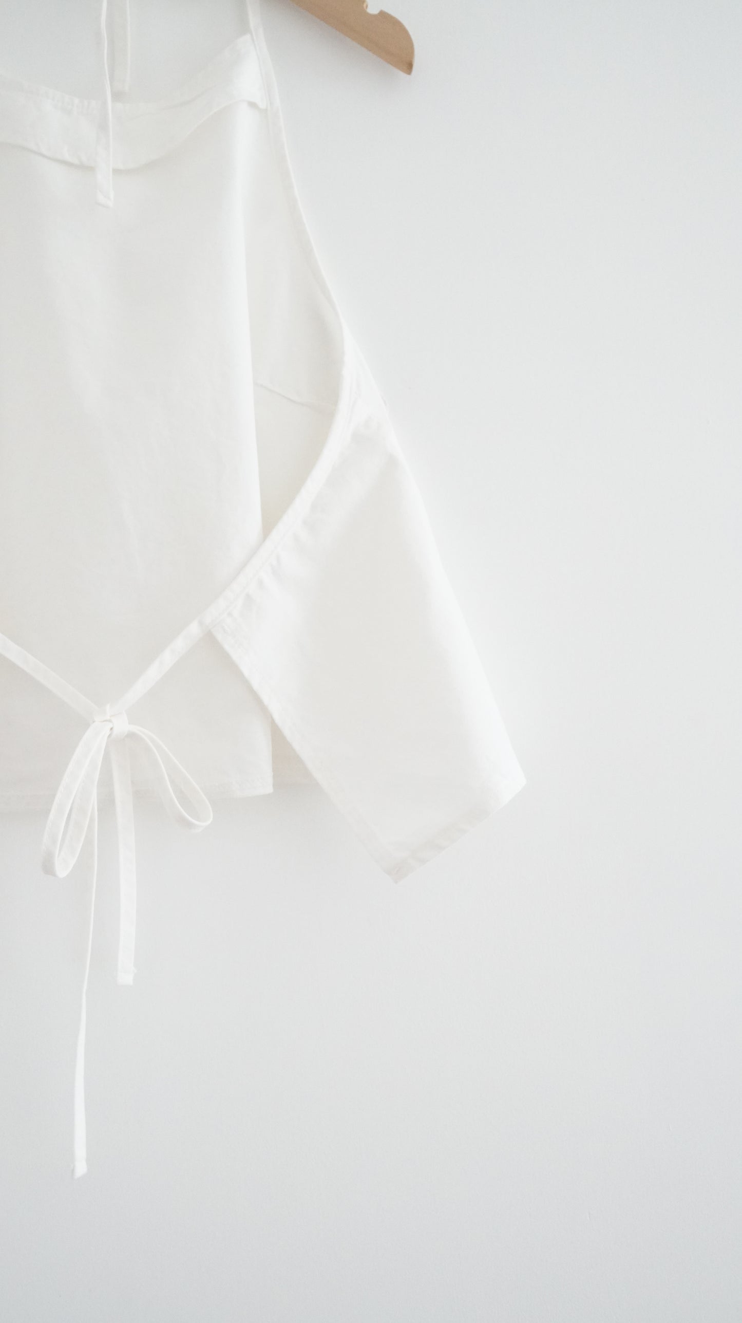 minimalist halter neck top in white