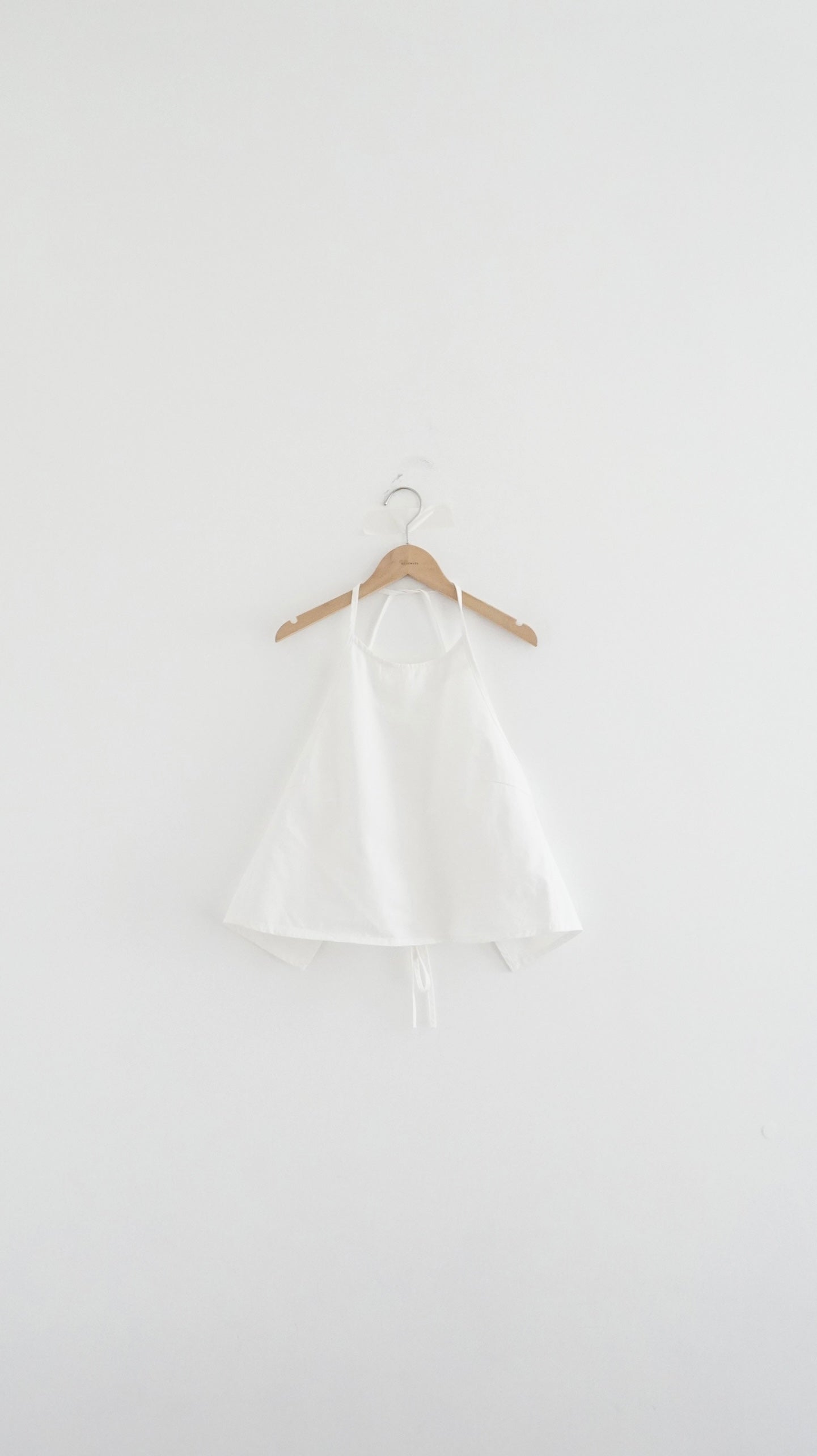 minimalist halter neck top in white