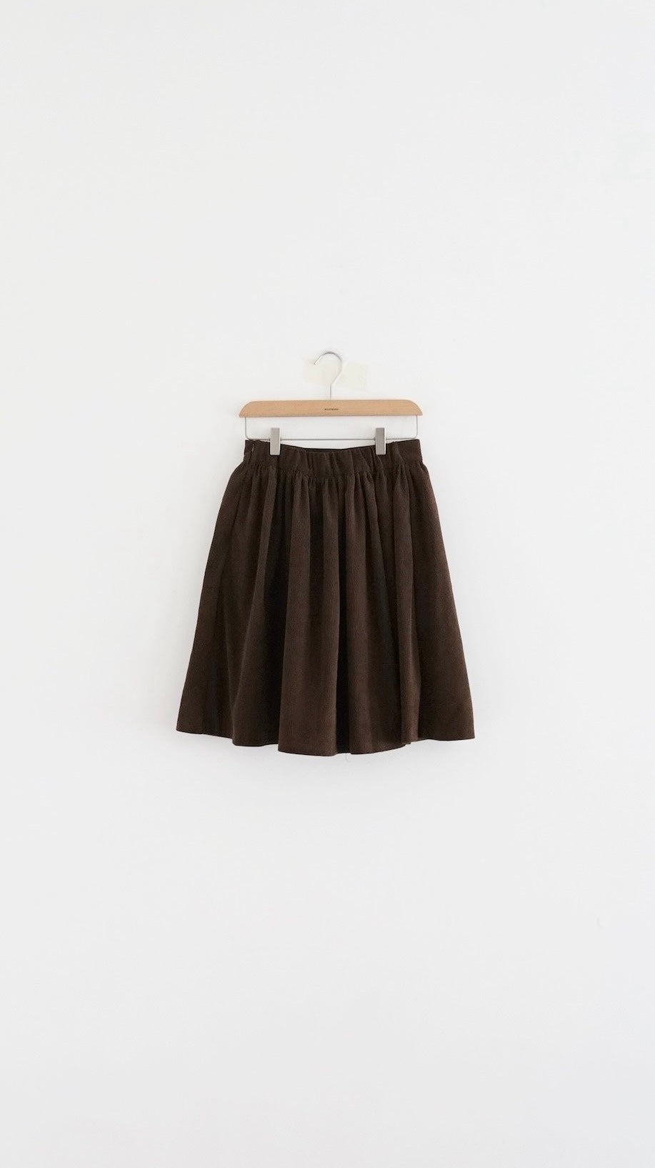 Alma wool midi skirt in beige (pre-order)