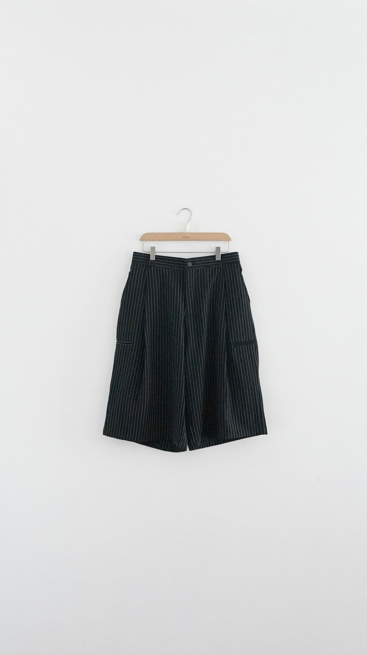 striped low-rise tailored shorts in black (pre-order)