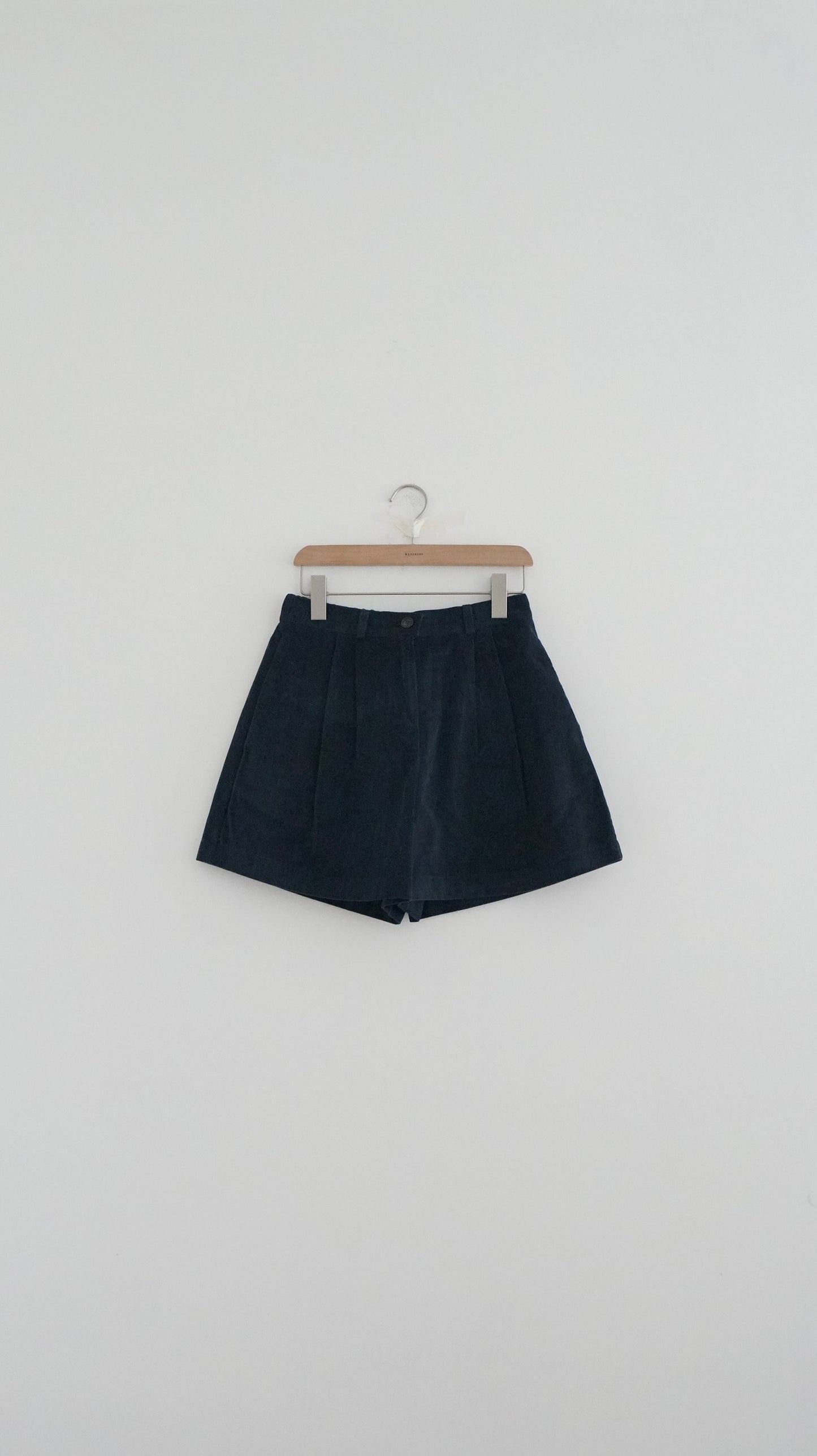 pleated corduroy shorts in navy (pre-order)