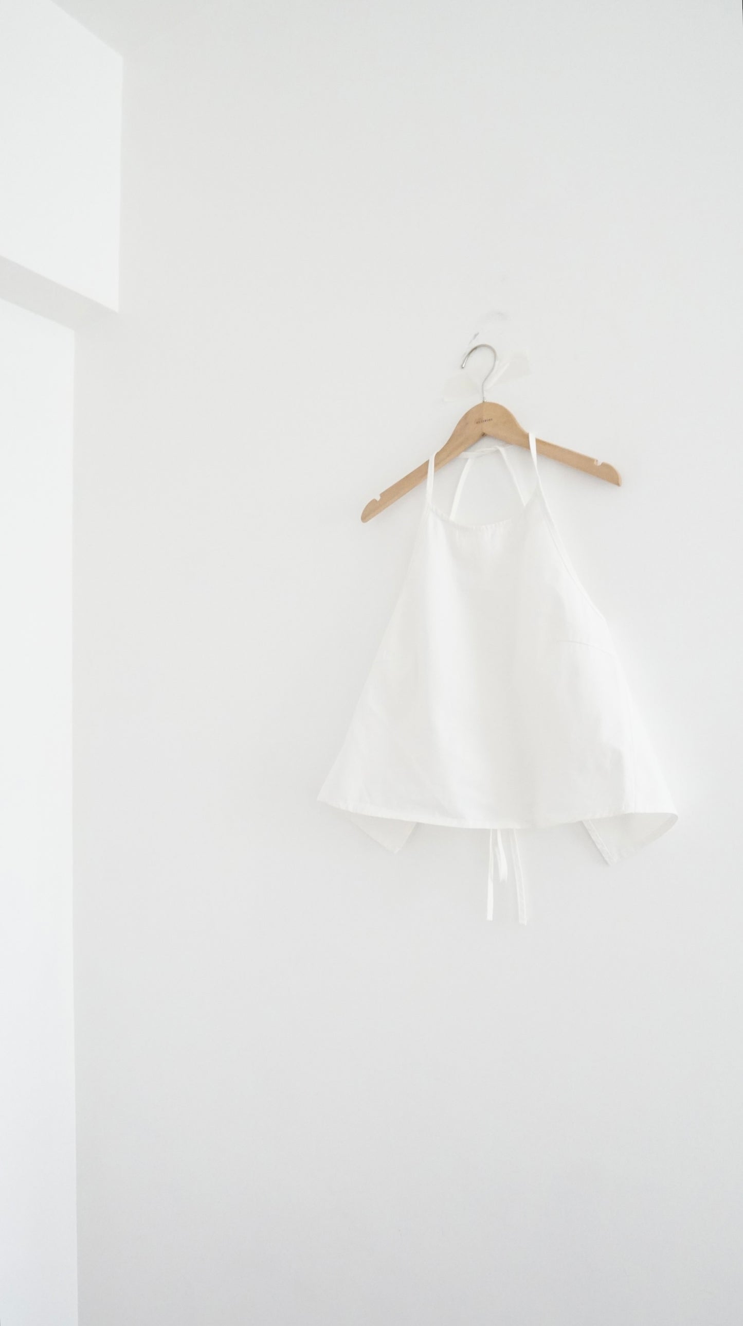 minimalist halter neck top in white