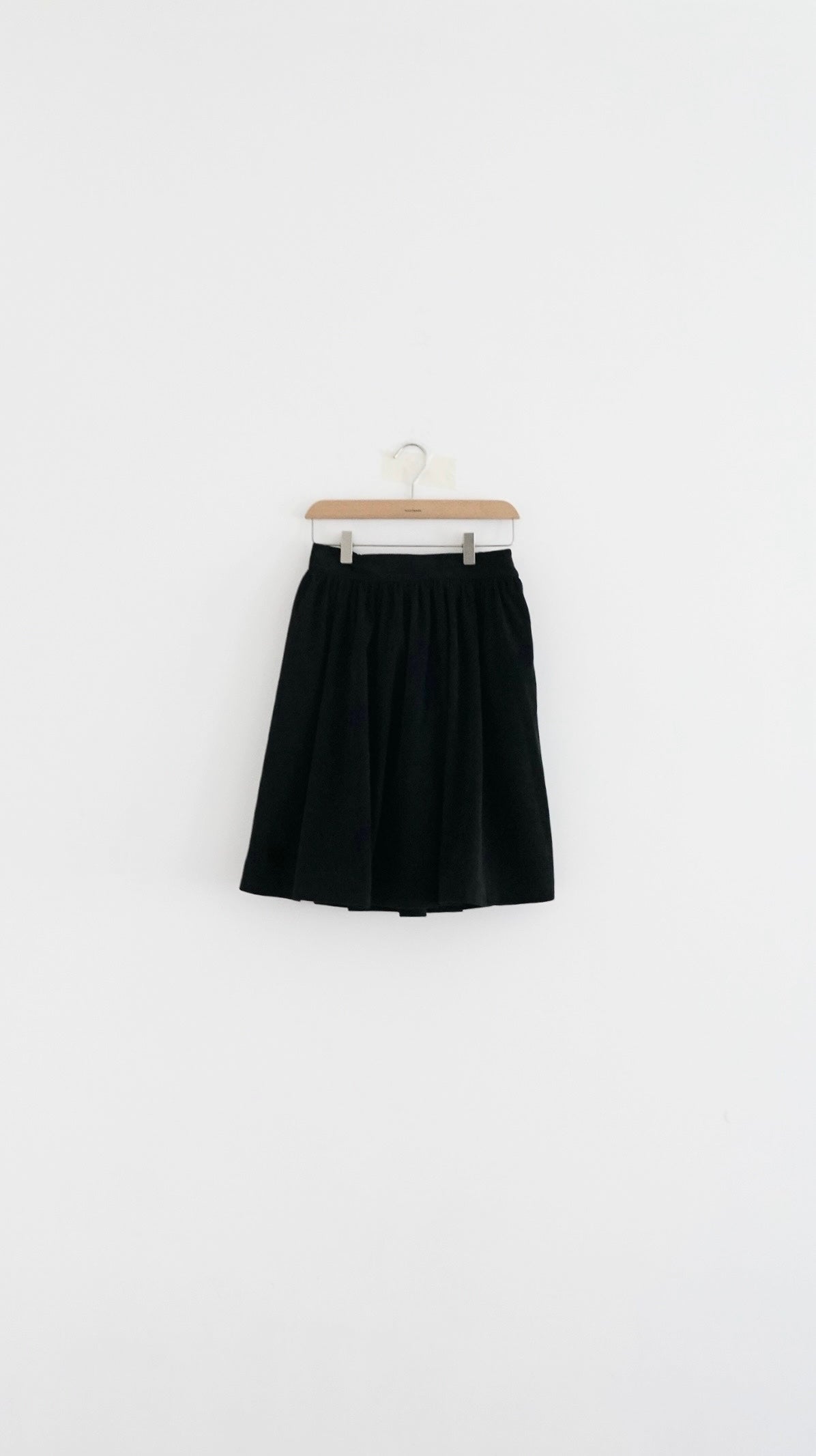 Alma wool midi skirt in black