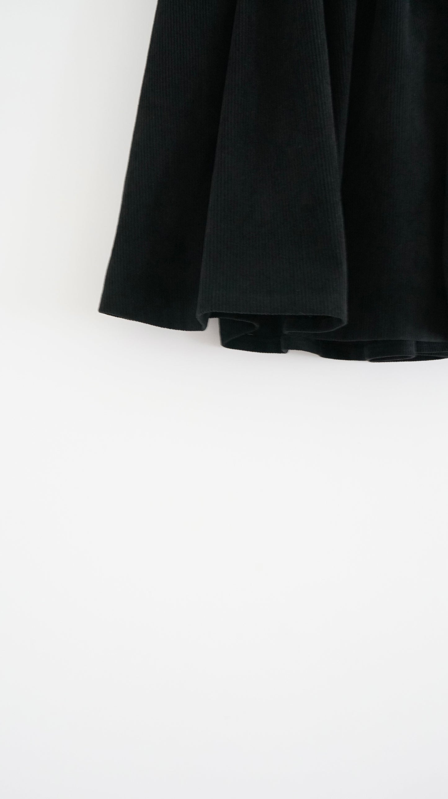 Alma wool midi skirt in black