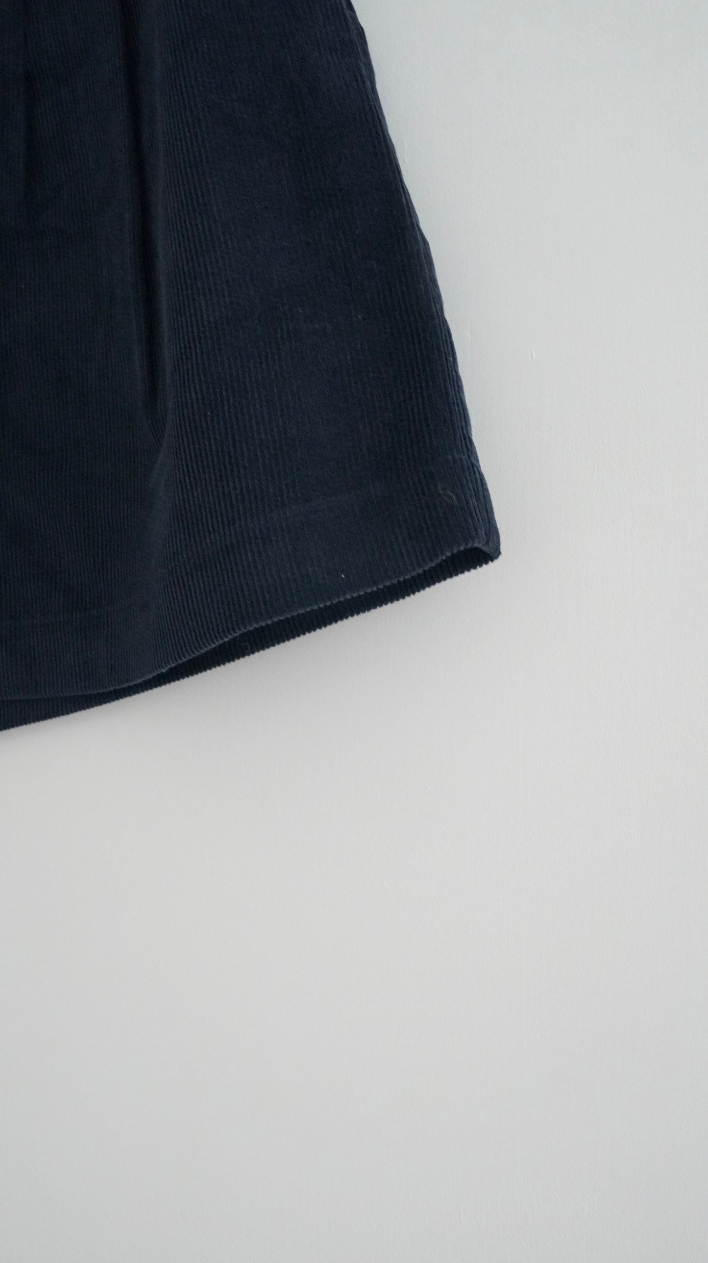 pleated corduroy shorts in navy (pre-order)