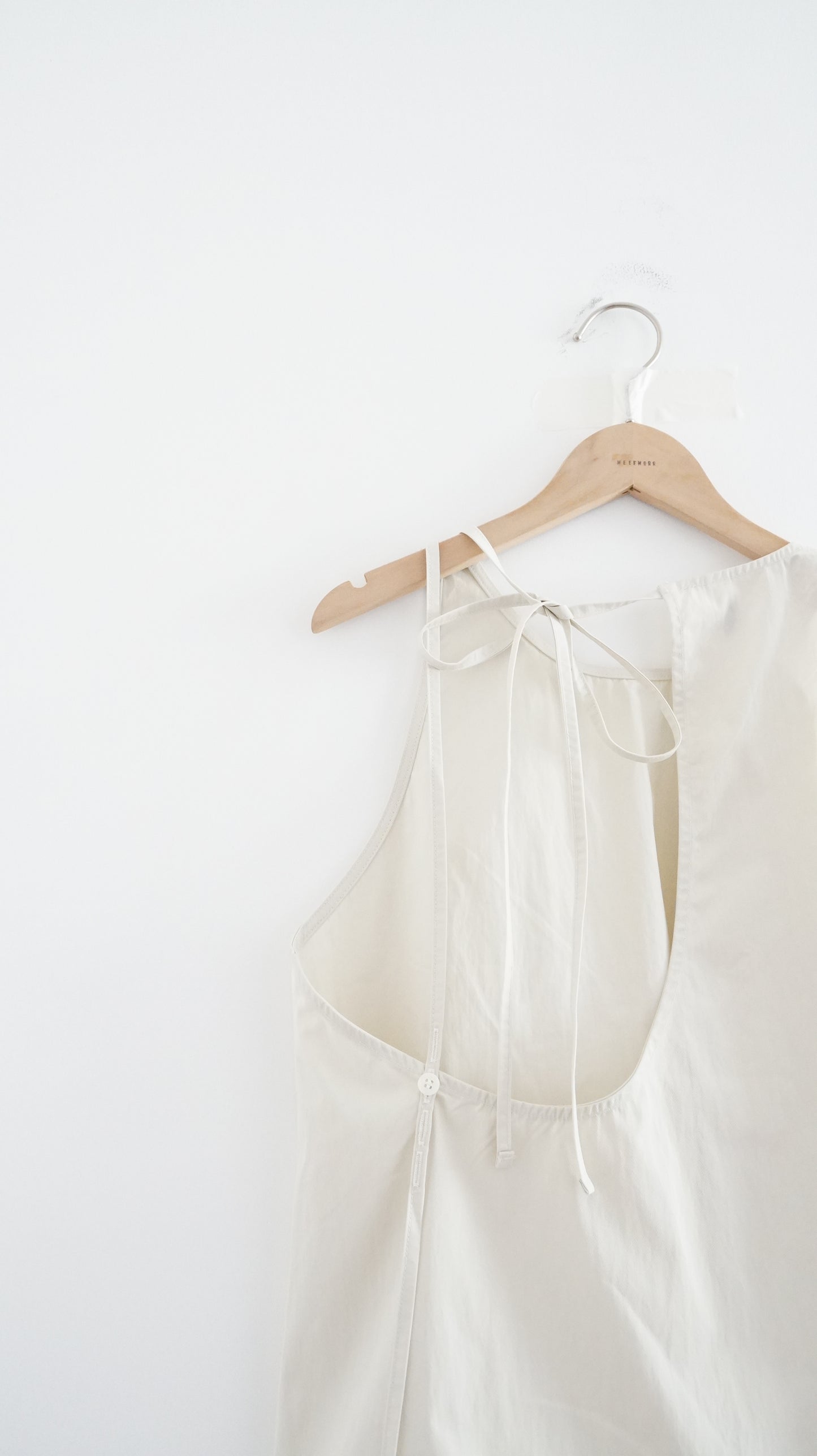 drift back bow tank in cream