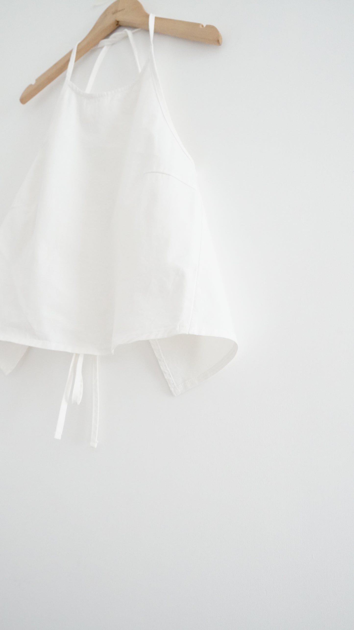 minimalist halter neck top in white