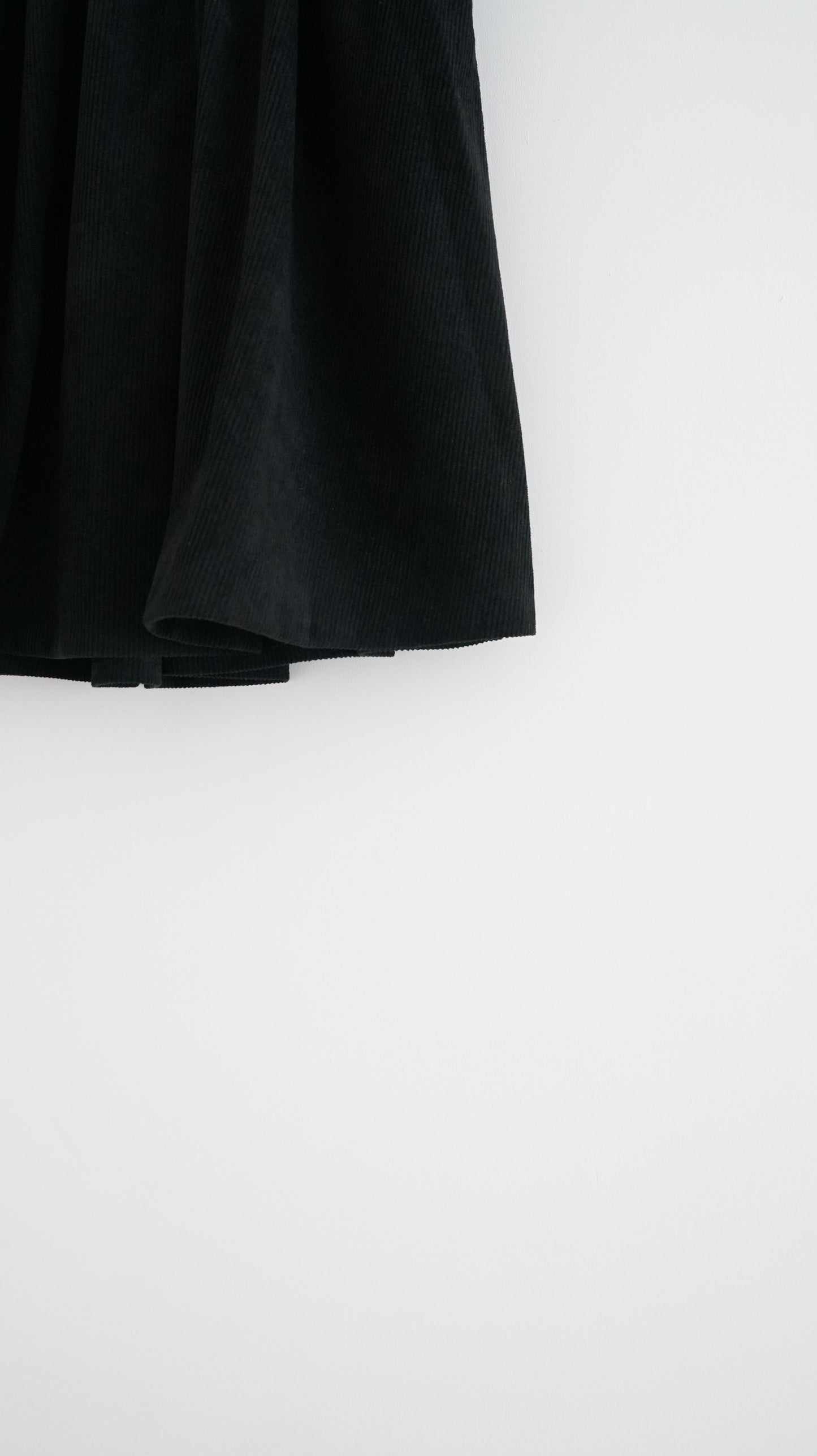 Alma wool midi skirt in black