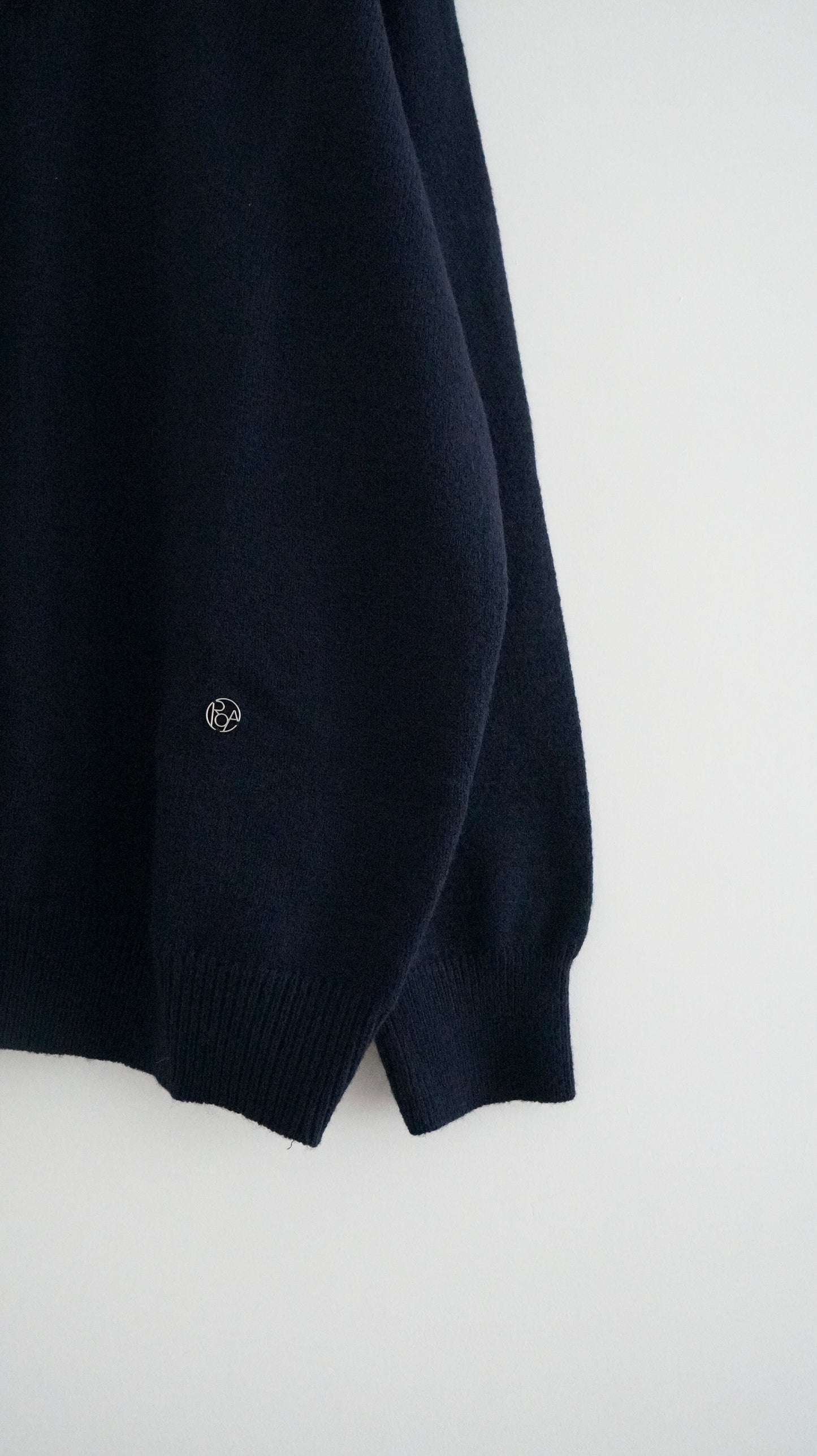 classic gender free v-neck wool sweater in navy