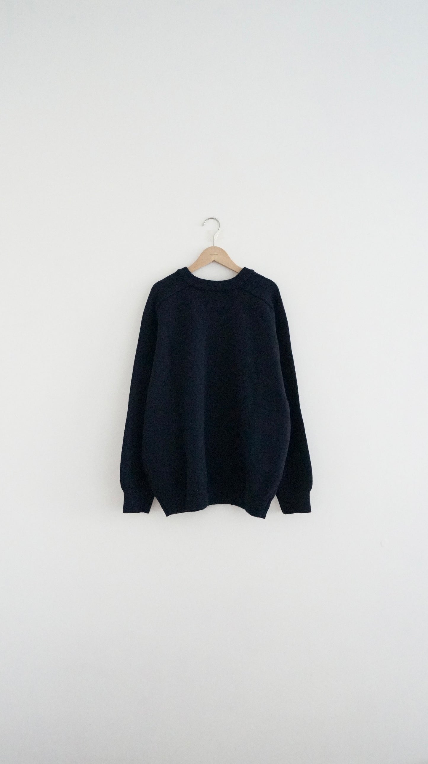 classic gender free v-neck wool sweater in navy