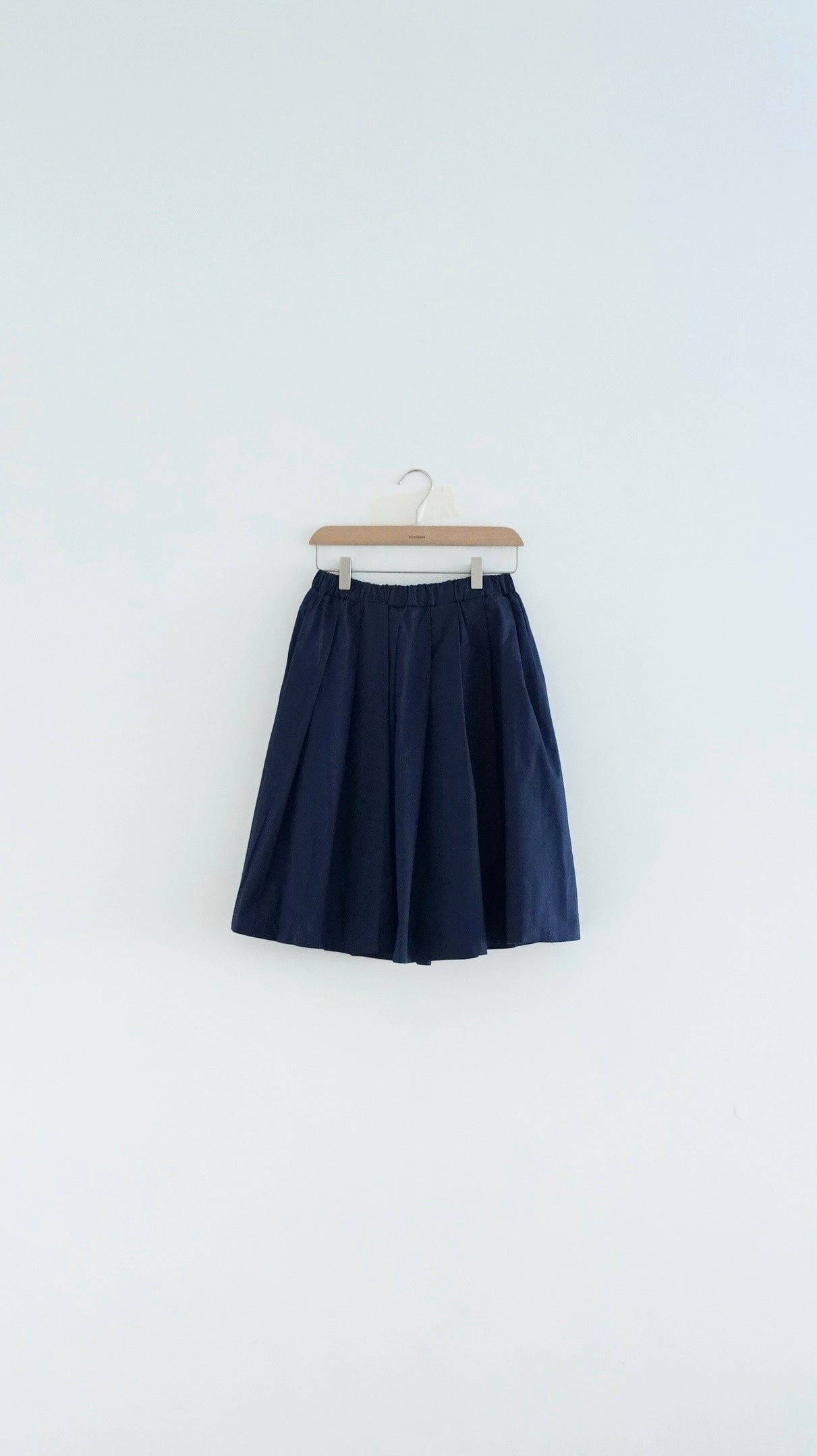 alma light midi skirt in navy (pre-order)