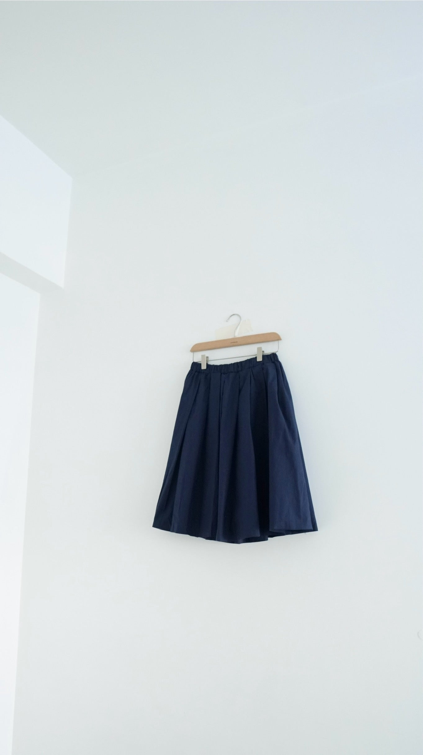 alma light midi skirt in navy (pre-order)
