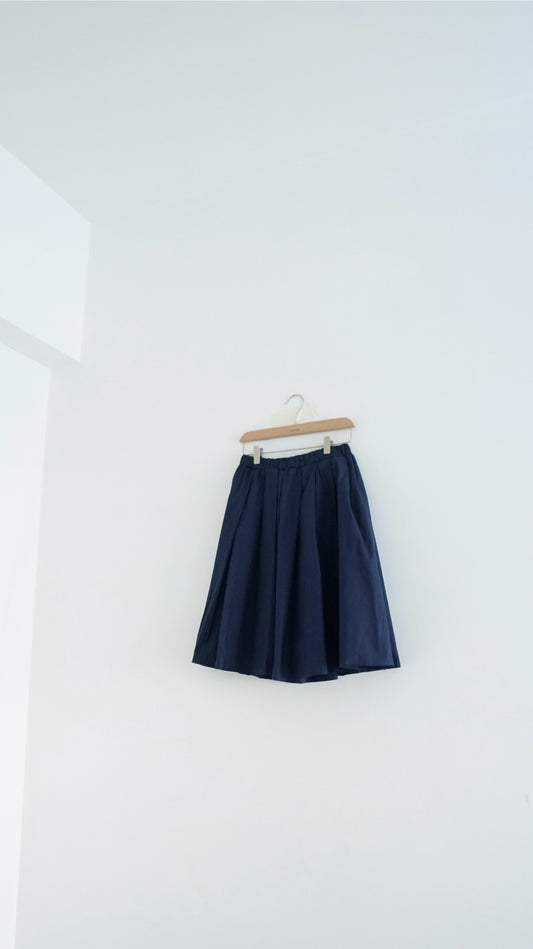 alma light midi skirt in navy (pre-order)
