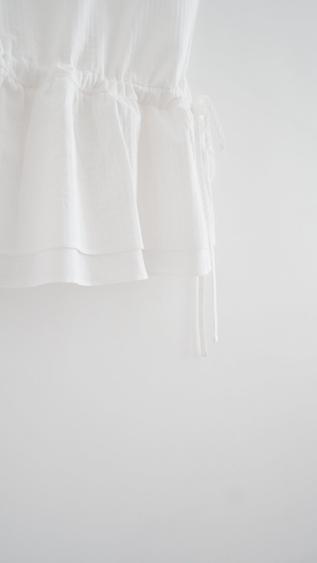 drawstring peplum camisole in white (pre-order)
