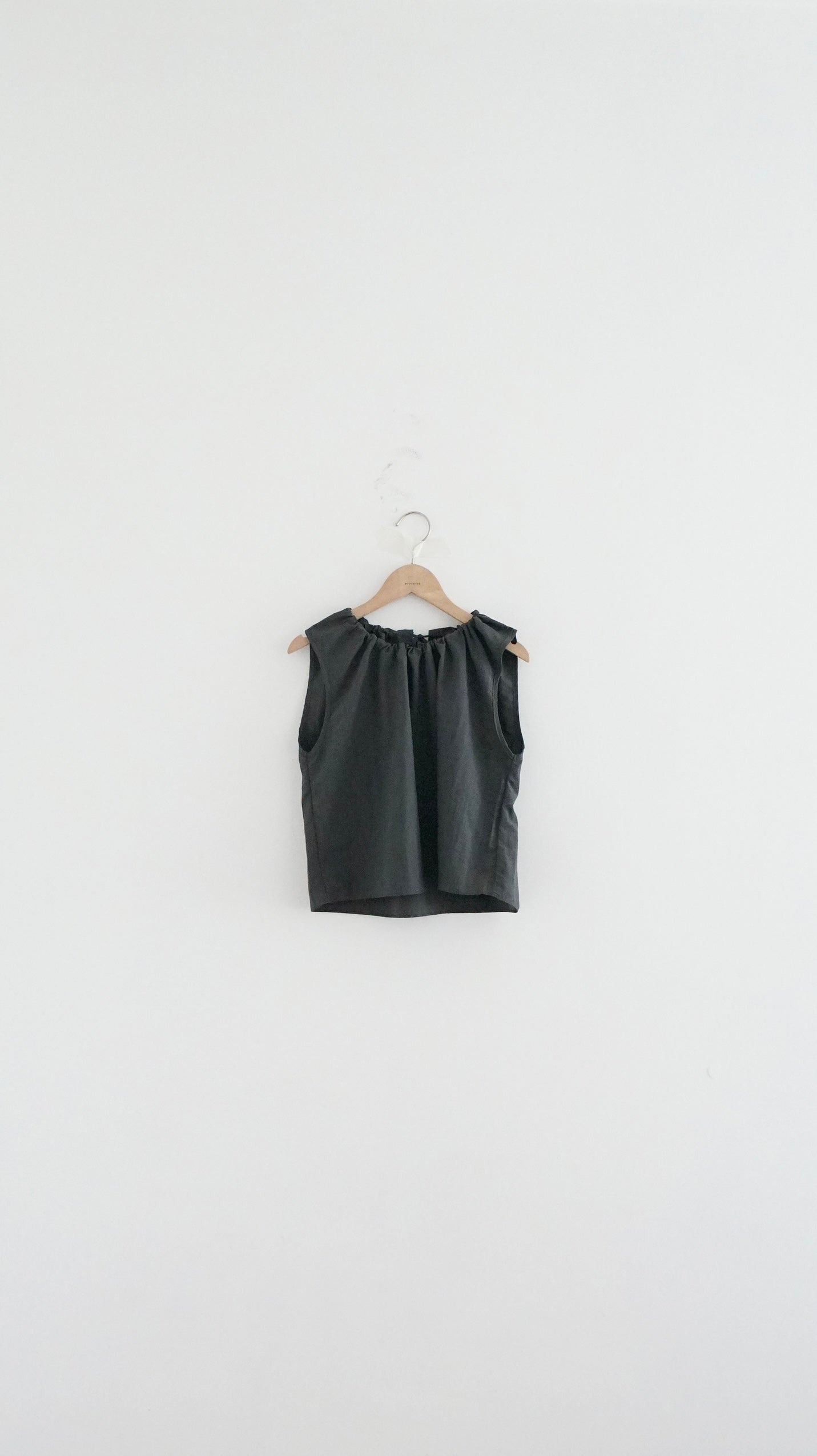 ruffle round neck blouse in charcoal (pre-order)