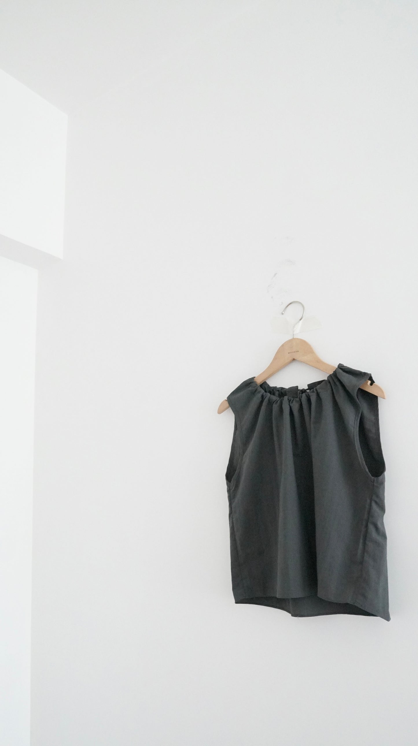 ruffle round neck blouse in charcoal (pre-order)