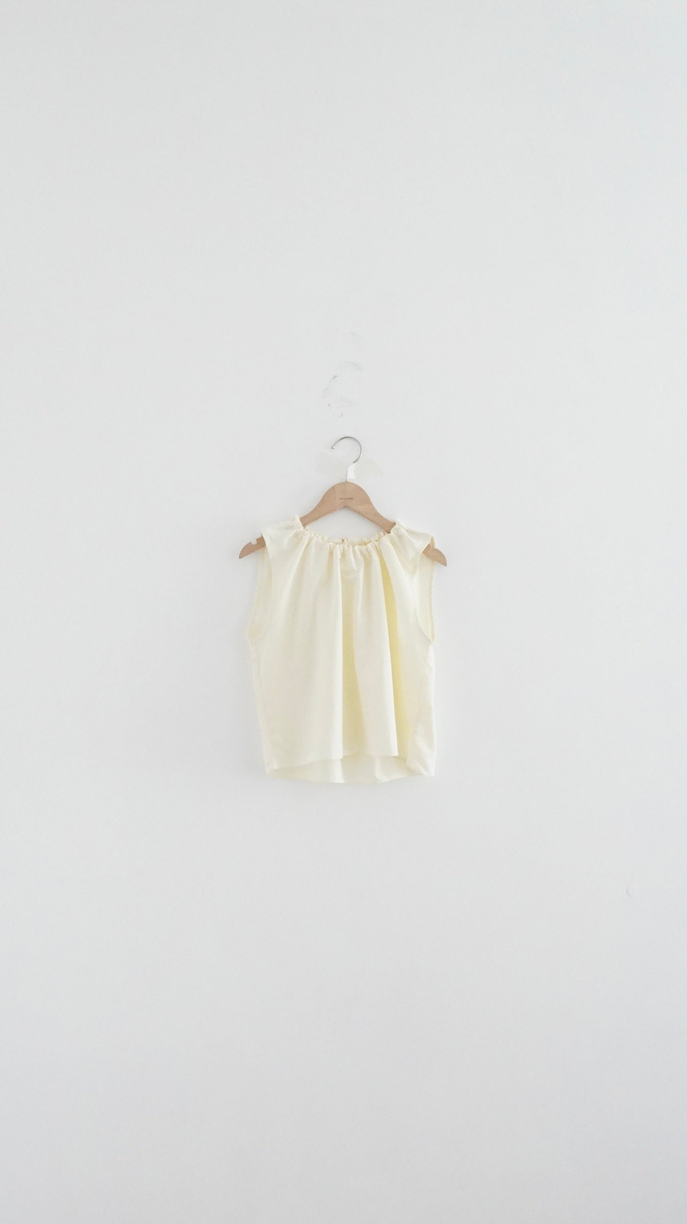 ruffle round neck blouse in cream (pre-order)