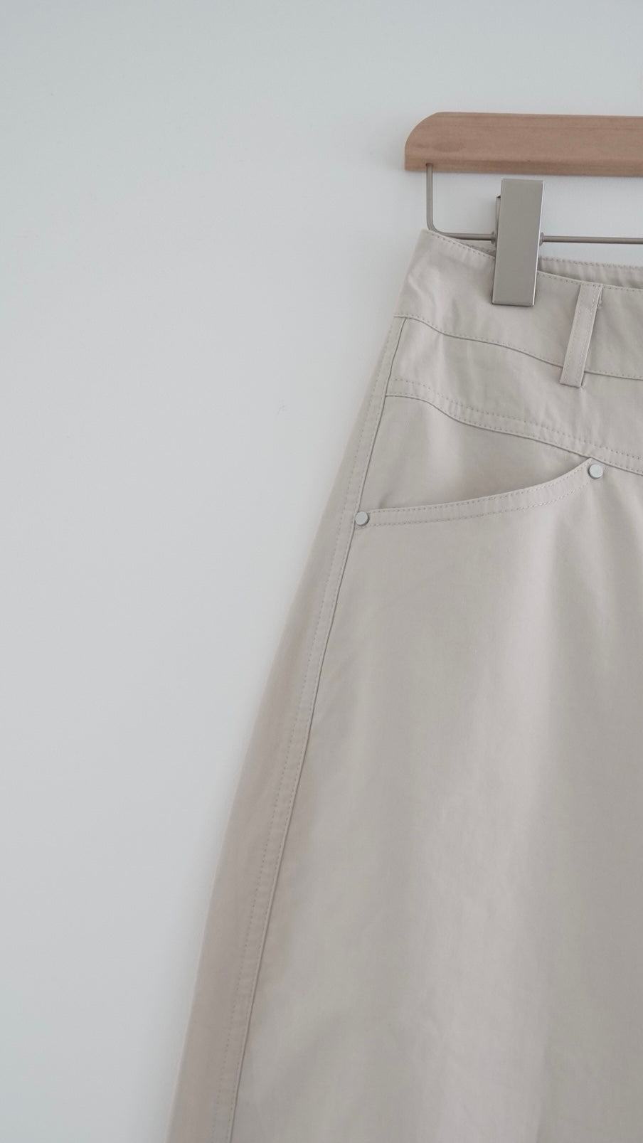 kaze curved seam wide-leg trousers in beige (pre-order)
