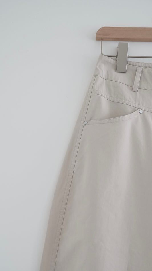 kaze curved seam wide-leg trousers in beige (pre-order)