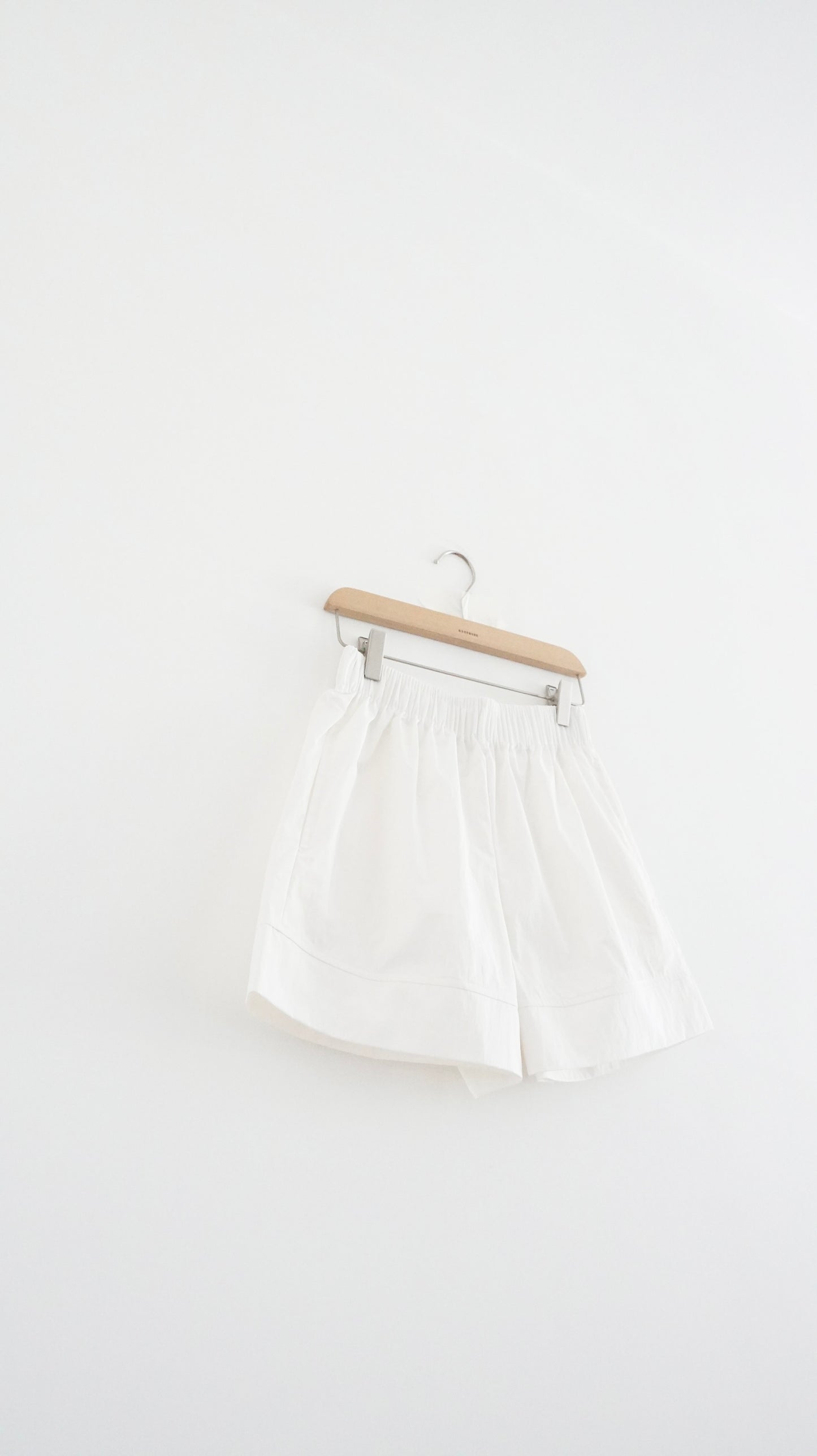 structured hem elastic shorts in white (pre-order)