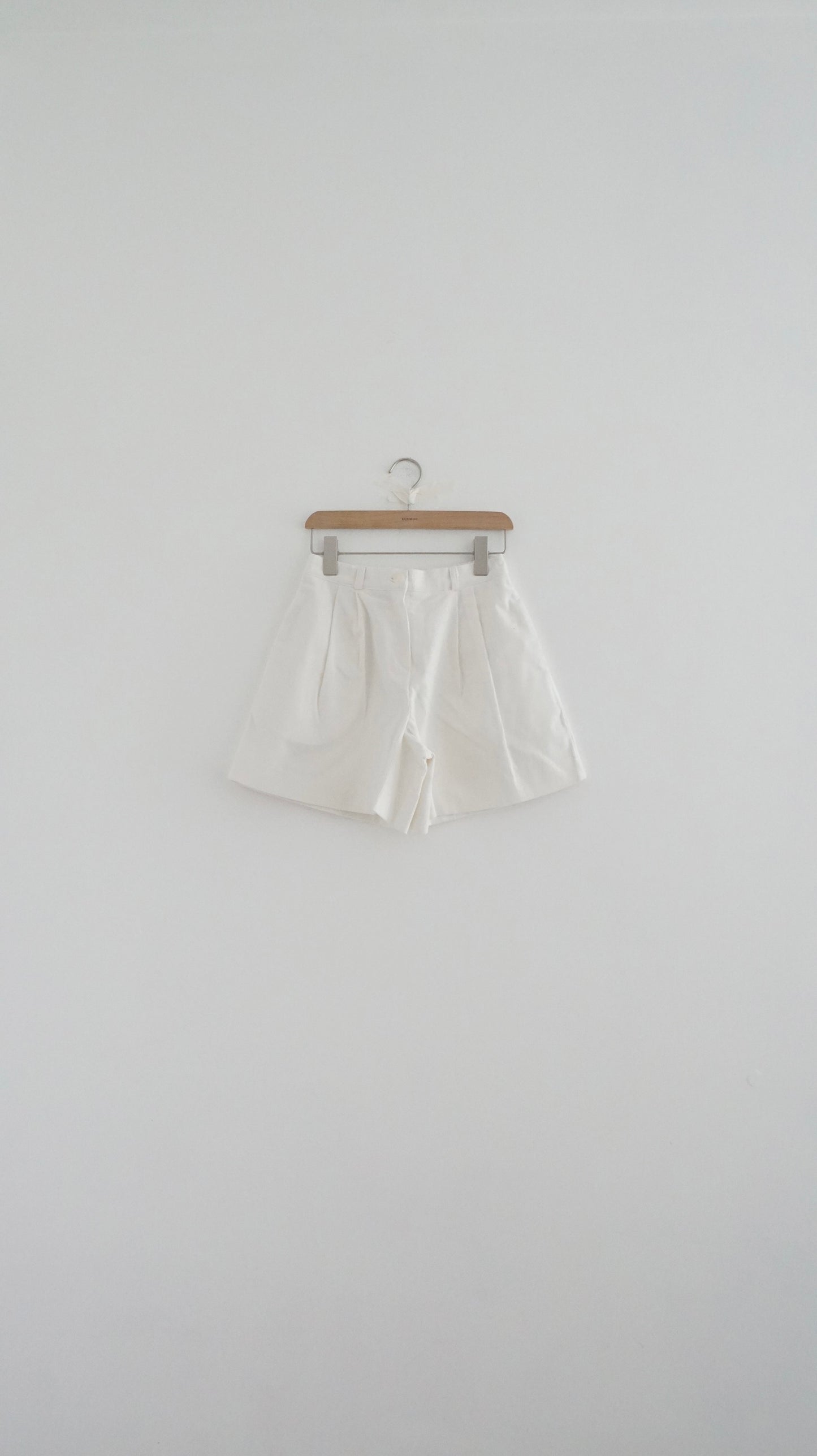 pleated corduroy shorts in white (pre-order)