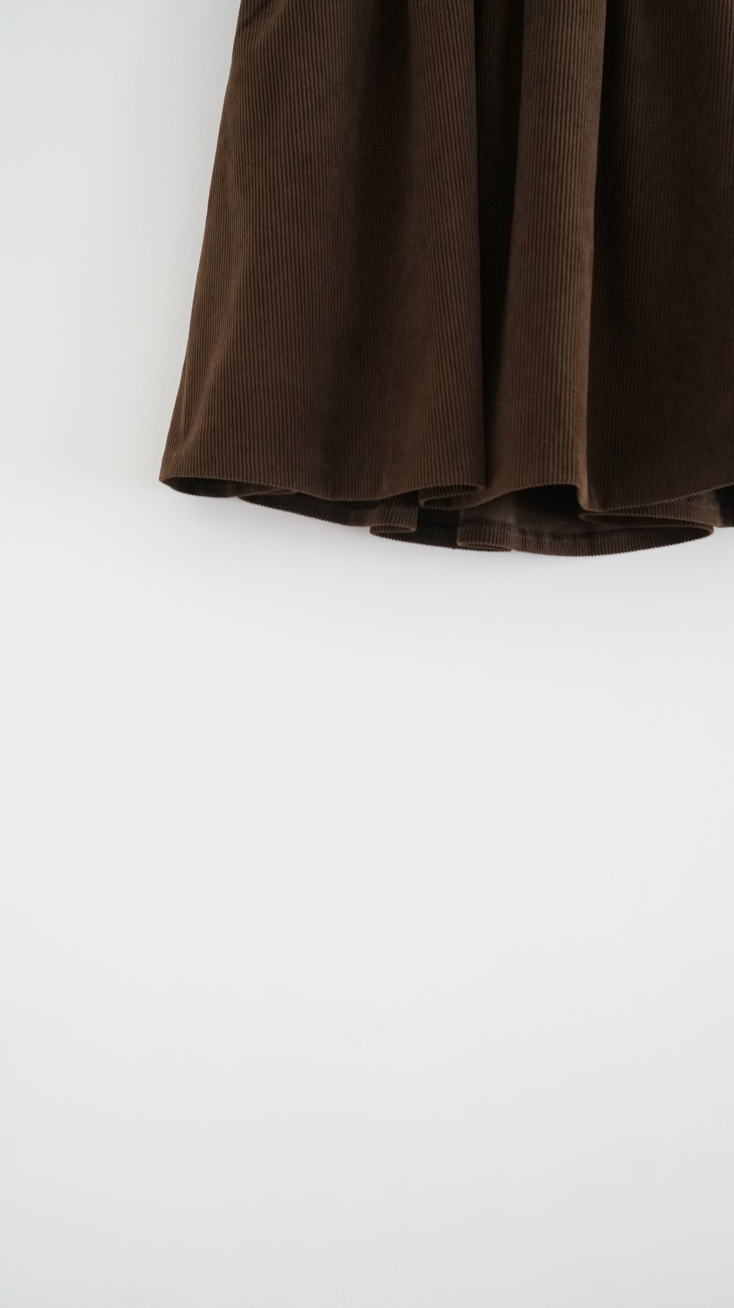 Alma wool midi skirt in beige (pre-order)