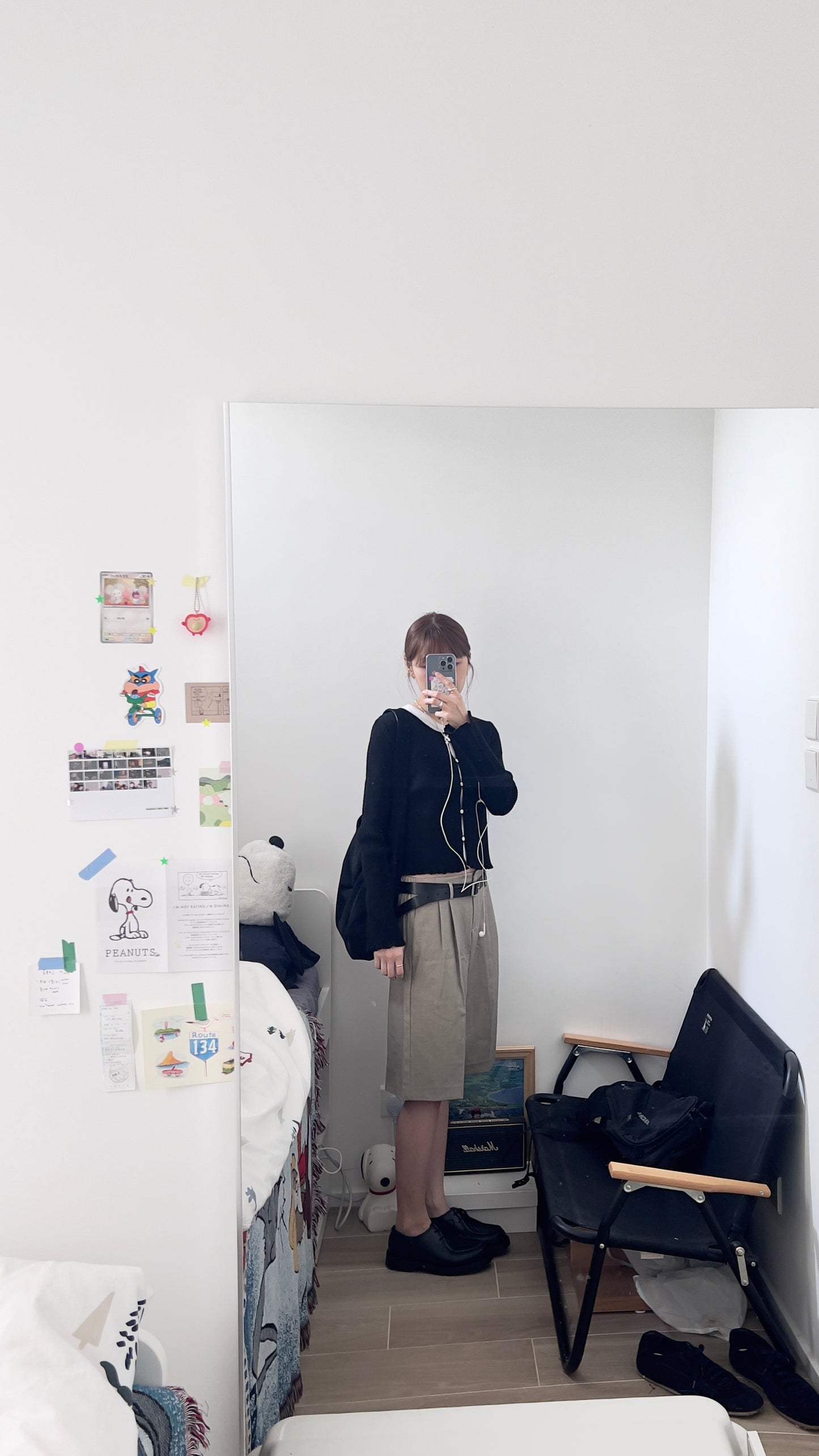 the elodie ruffle cardigan in black
